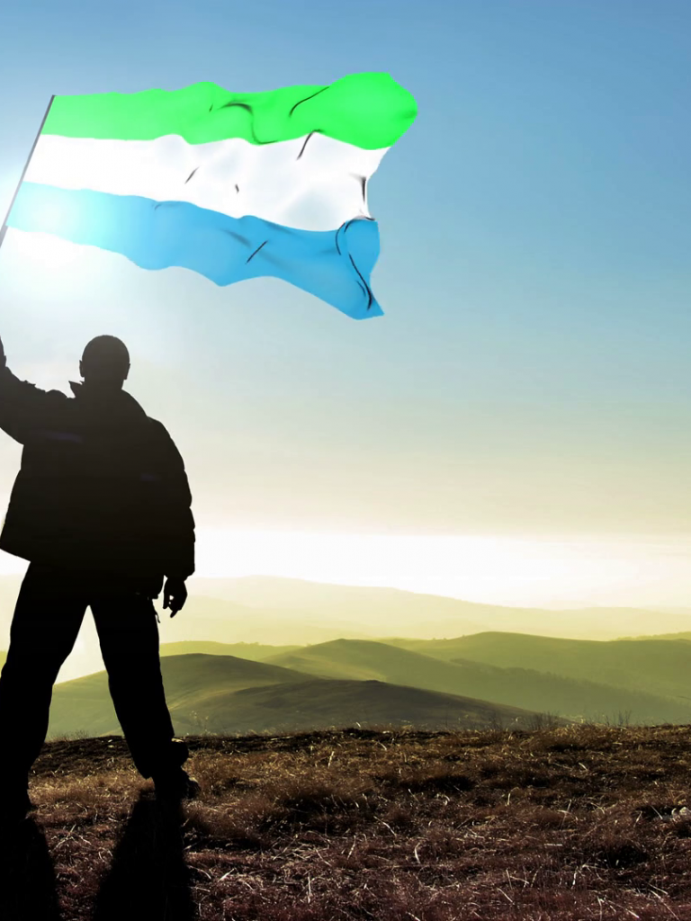 Free download Successful silhouette man winner waving Sierra Leone flag on Stock [1920x1080] for your Desktop, Mobile & Tablet. Explore Sierra Leone Flag Wallpaper. Sierra Leone Flag Wallpaper, Sony