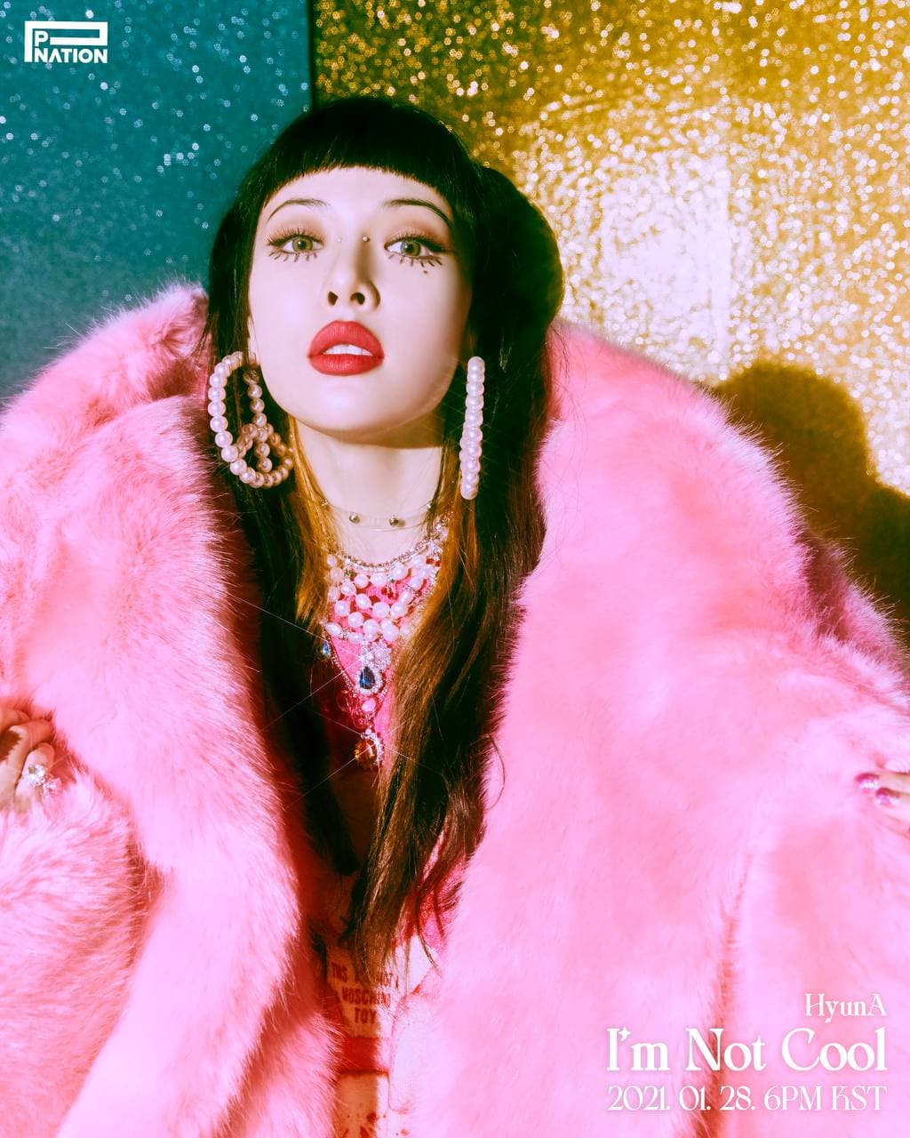 Watch: HyunA Says “I'm Not Cool” In Colorful Comeback MV