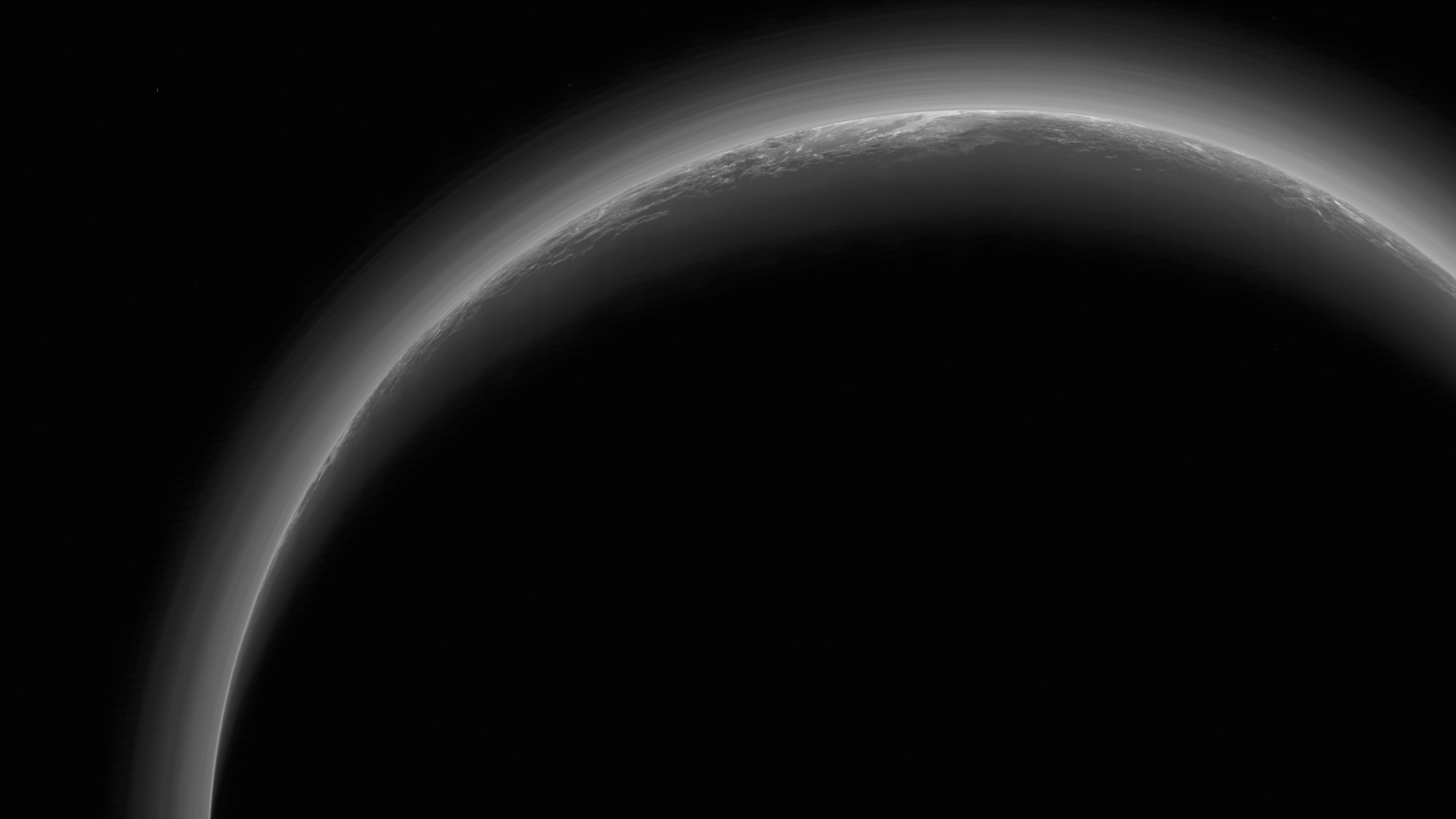 Pluto 4K wallpaper for your desktop or mobile screen free and easy to download