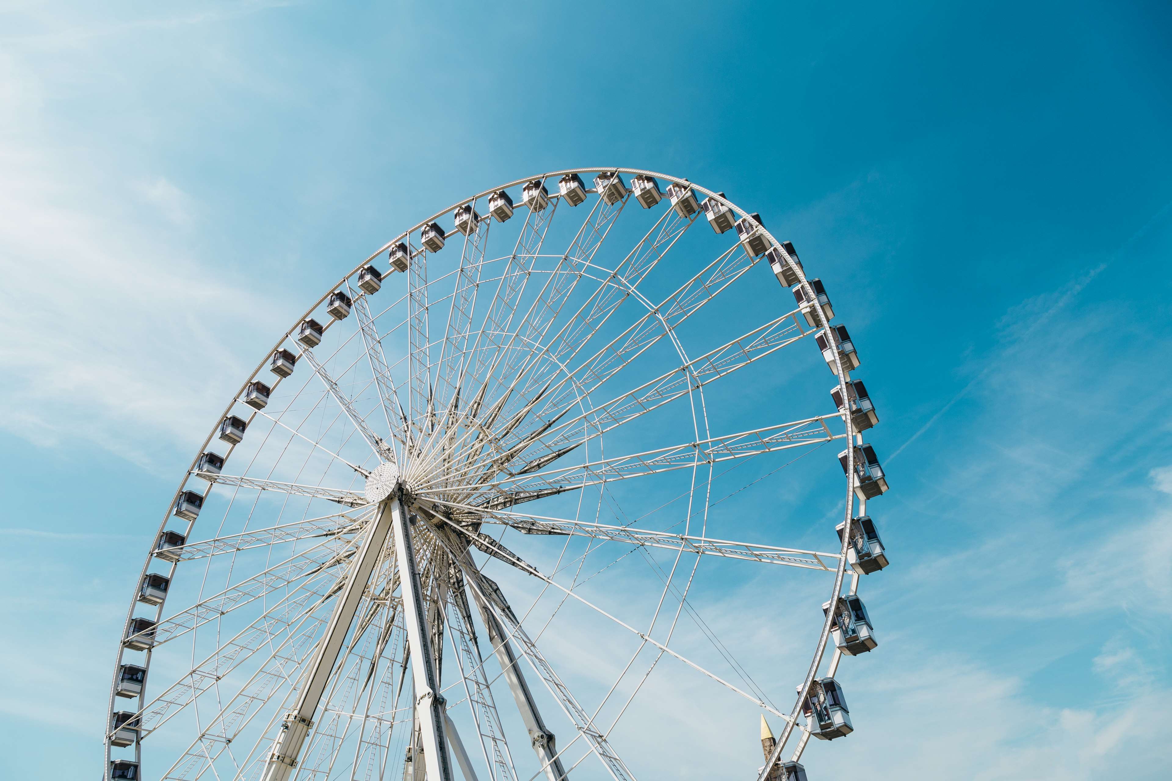 amusement park, blue sky, bright, carnival, clouds, daylight, entertainment, fairground, ferris wheel, fun, height, high, leisure, low angle shot, outdoors, round, sky, spin, turning, wheel 4k wallpaper