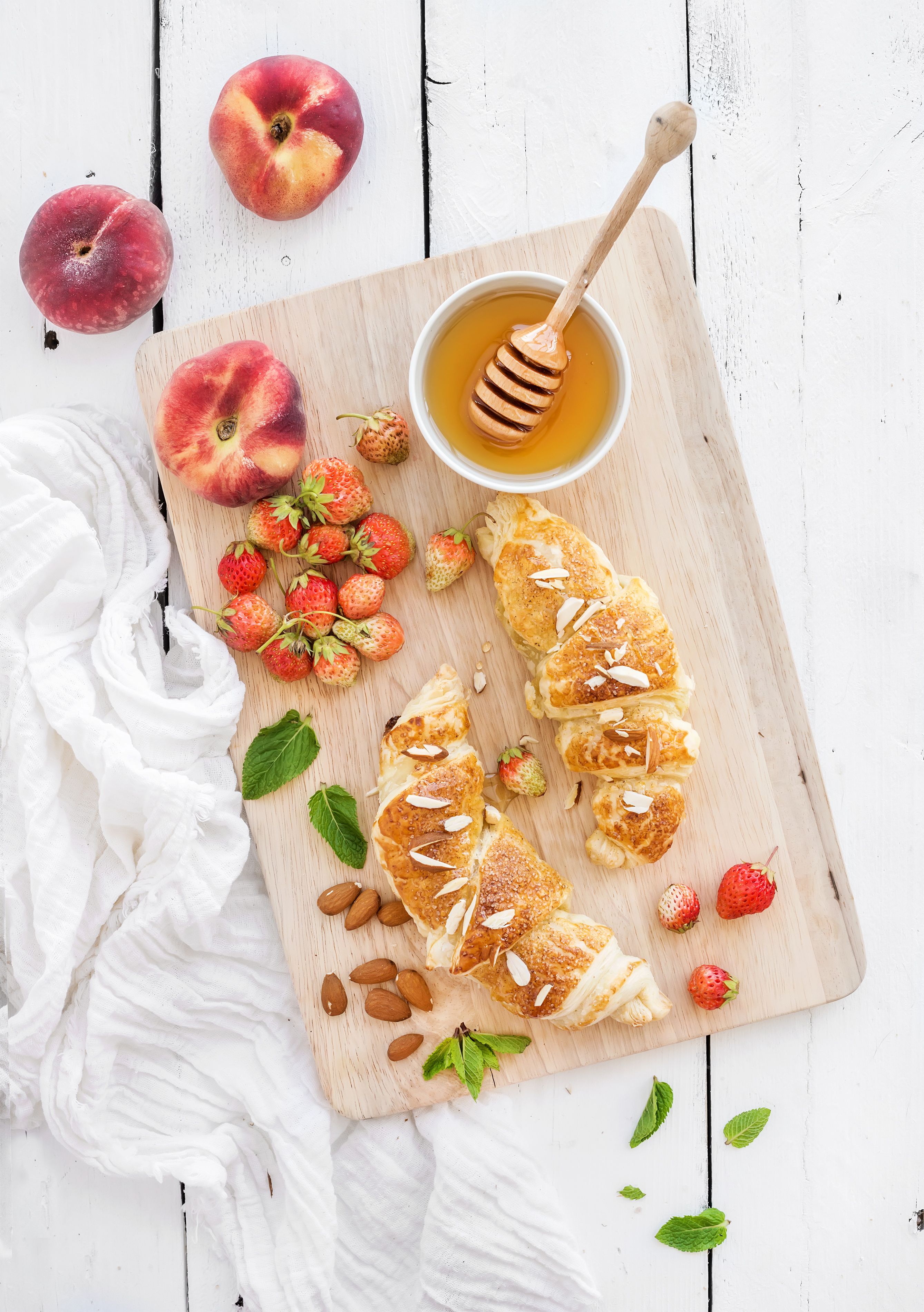 Photo Honey Croissant Peaches Food Cutting board Nuts Wood 2677x3800