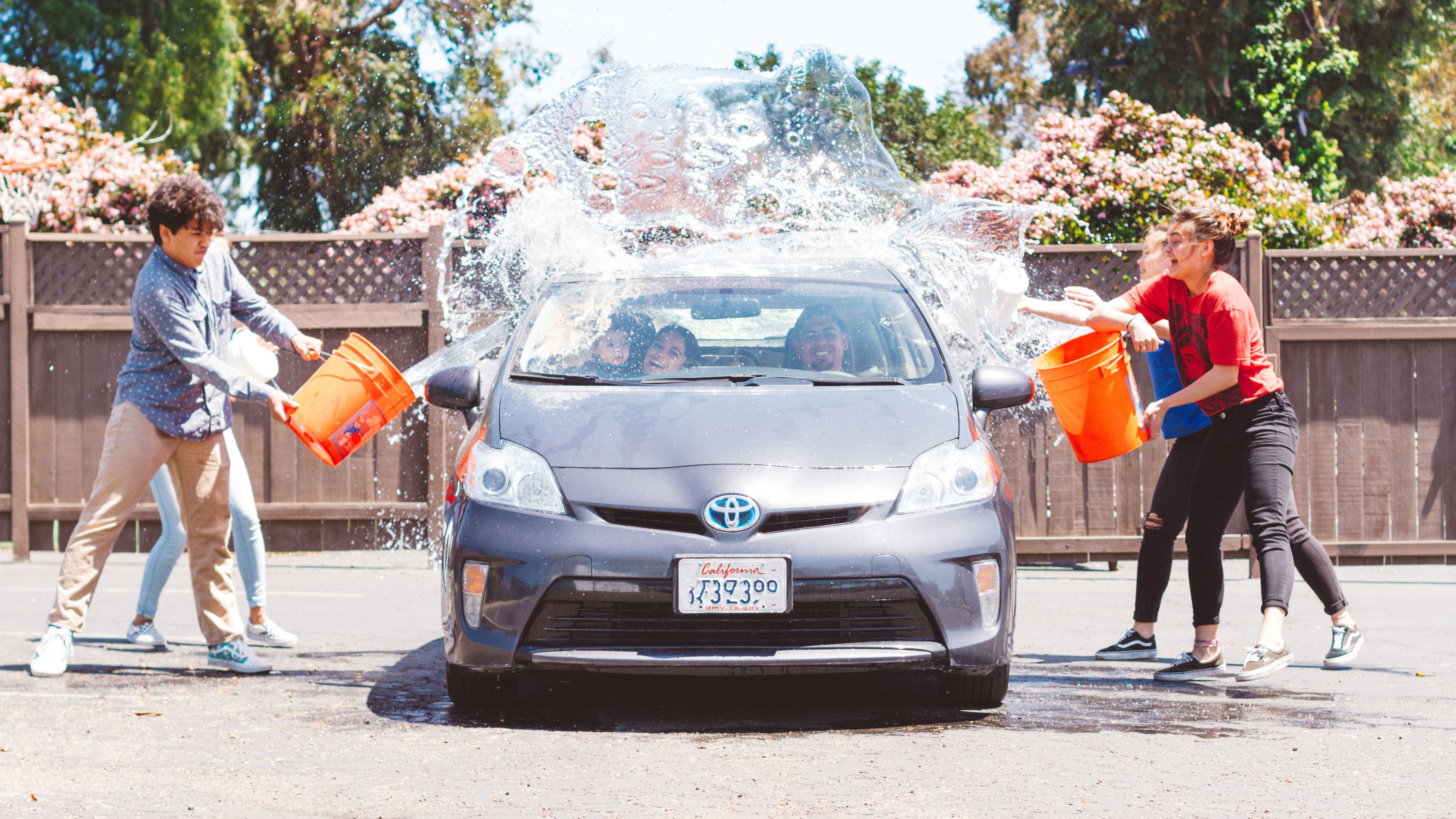 Four Children Washing Silver Toyota Prius · Free