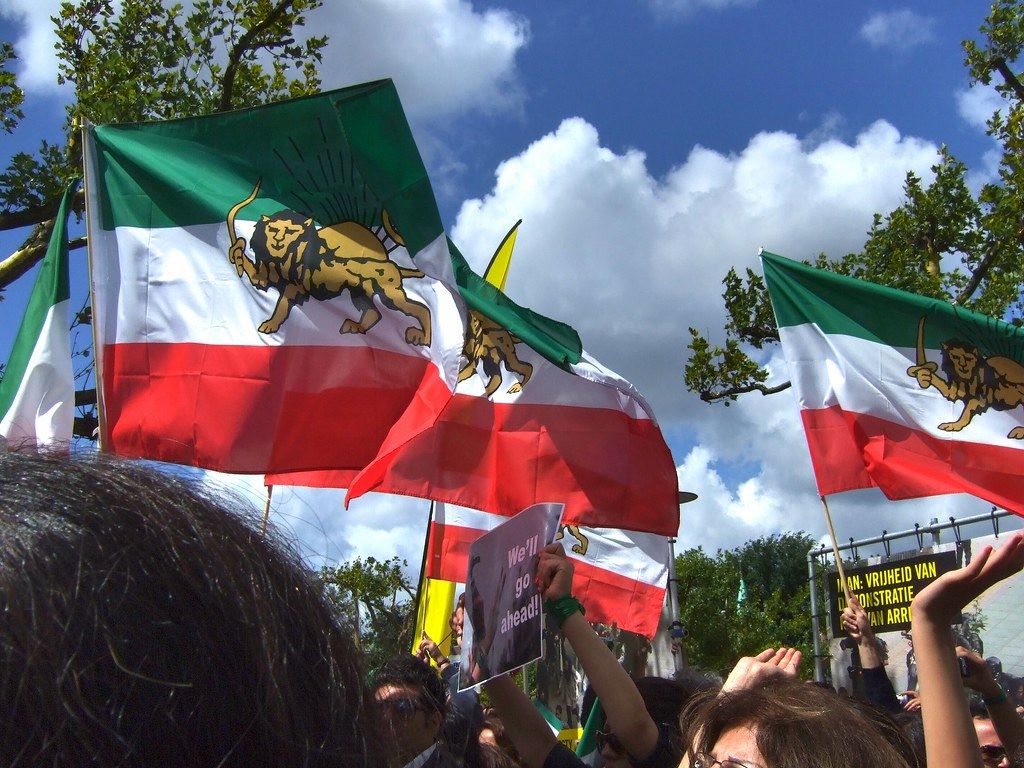 Flags with lion and sun emblem. United for Iran Da