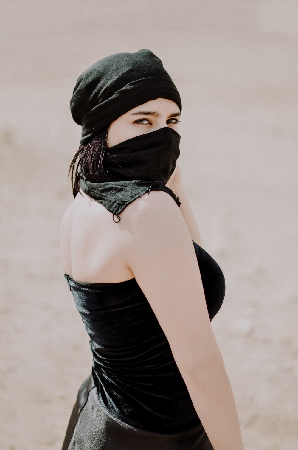 woman wearing niqab and black tube dress photo