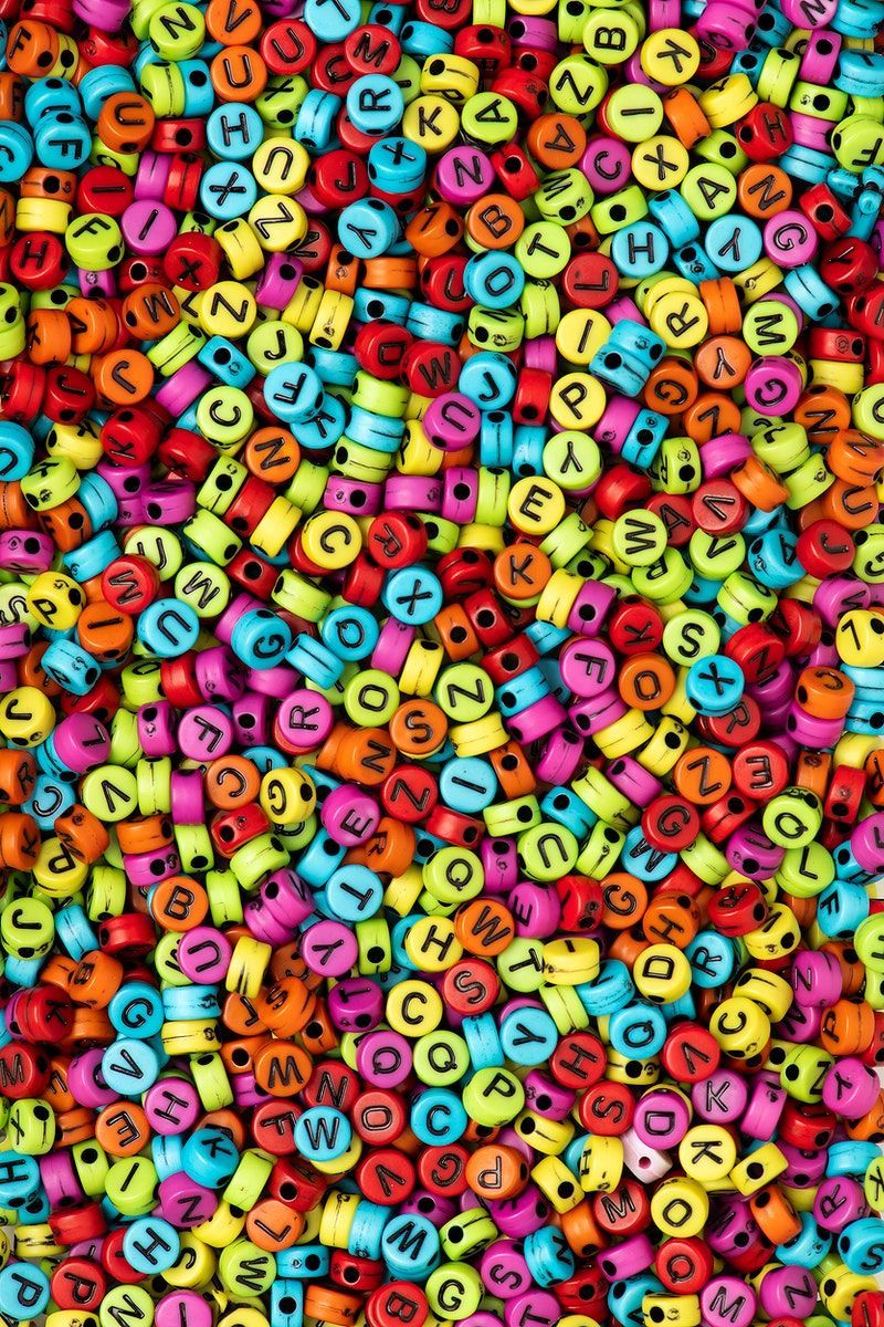Colorful English letter alphabet beads wallpaper background. free image by rawpixel.com / KUTTHALEEYO. Alphabet beads, Lettering alphabet, Wallpaper