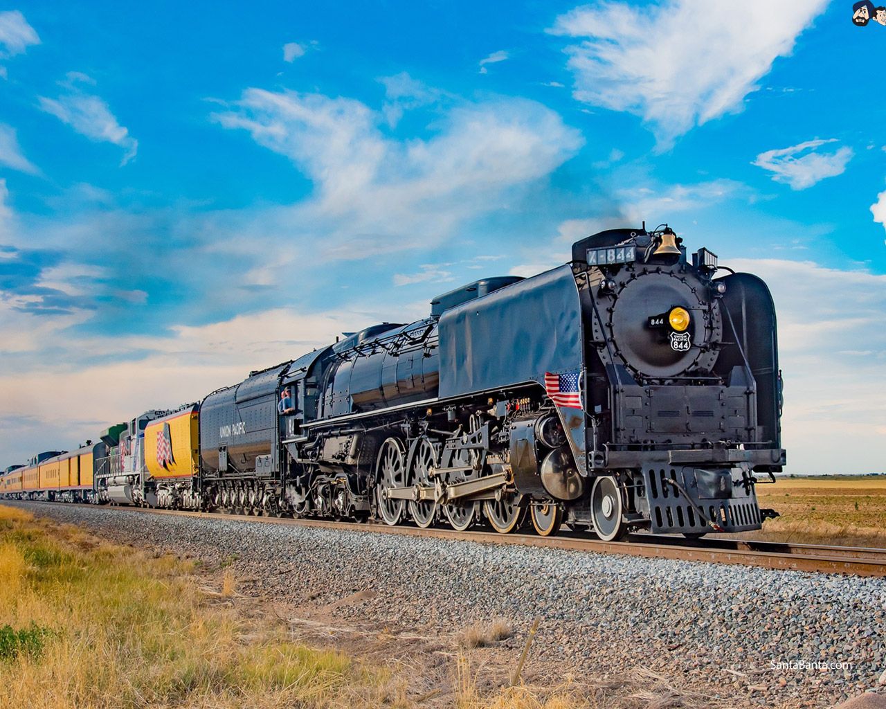 Union Pacific`s freight hauling railroad (Steam engine retro train)