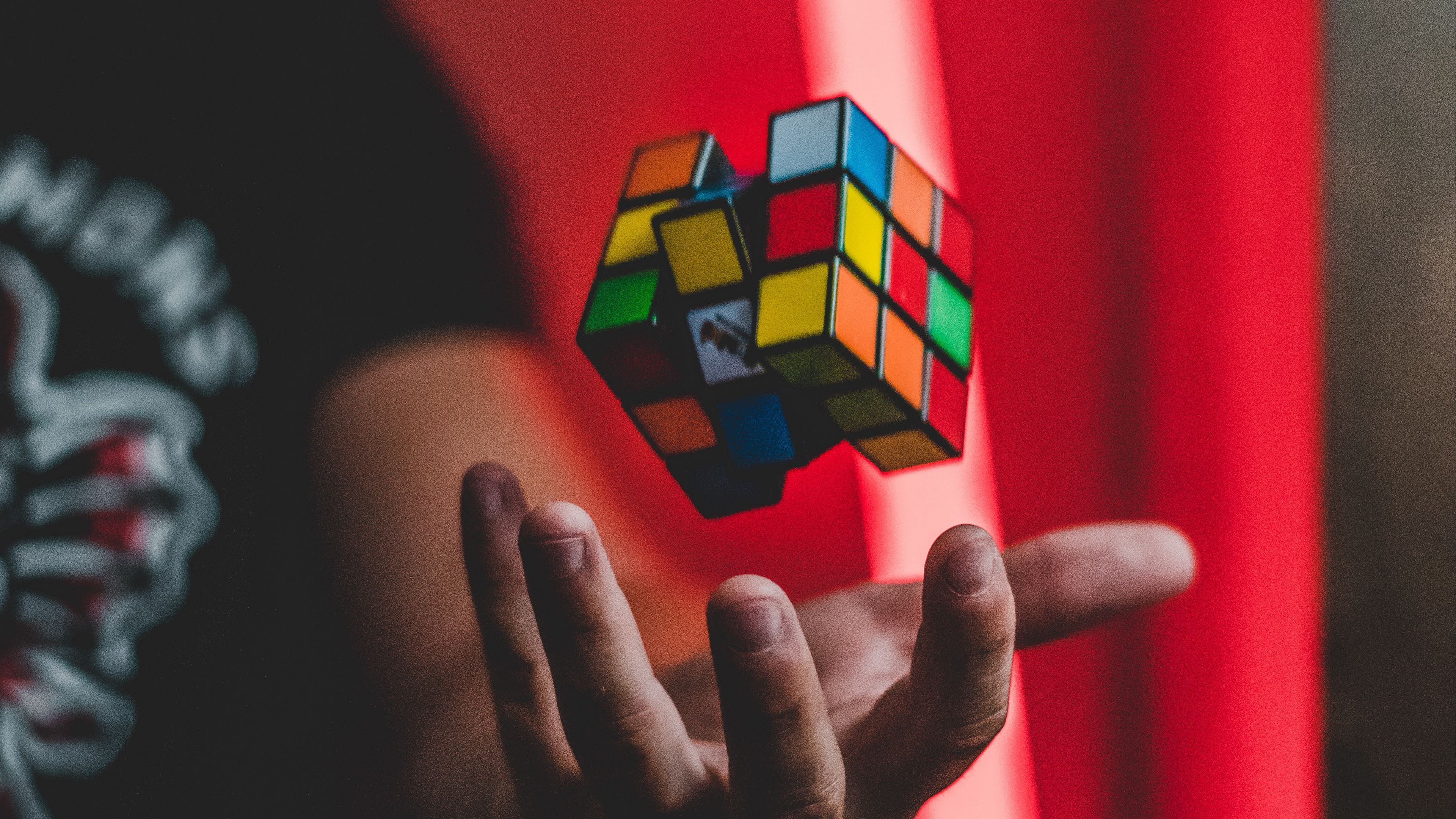 Download wallpaper 3840x2160 rubiks cube, hand, levitation, colorful 4k uhd 16:9 HD background