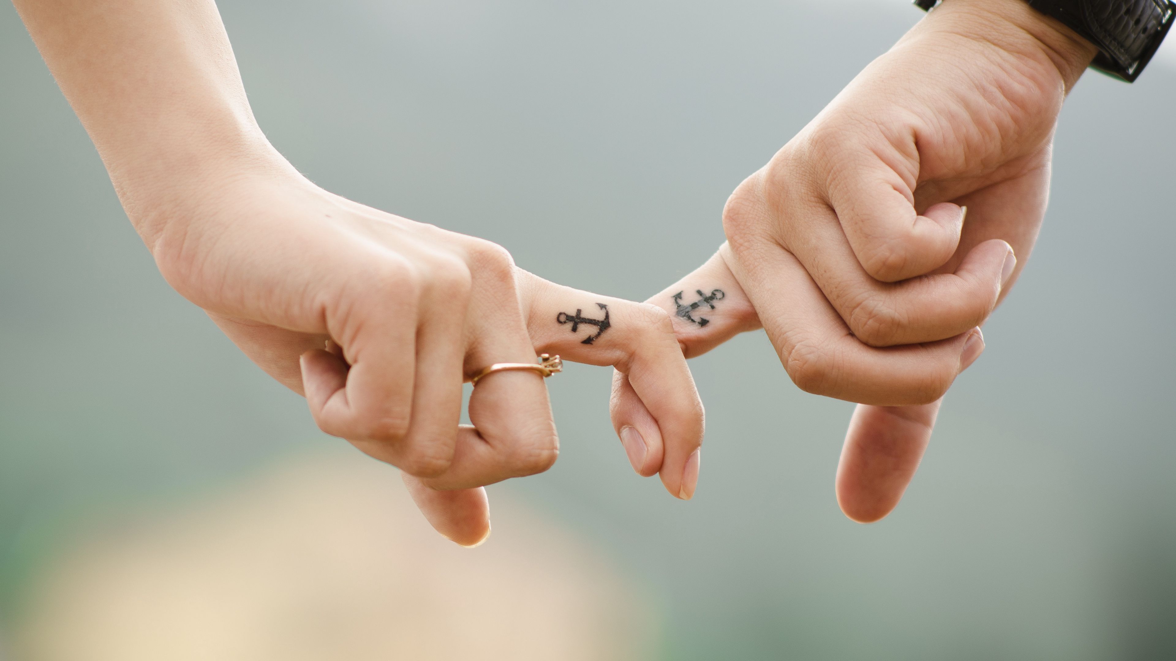 Download wallpaper 3840x2160 love, hands, romance, tattoos, couple, anchor 4k uhd 16:9 HD background