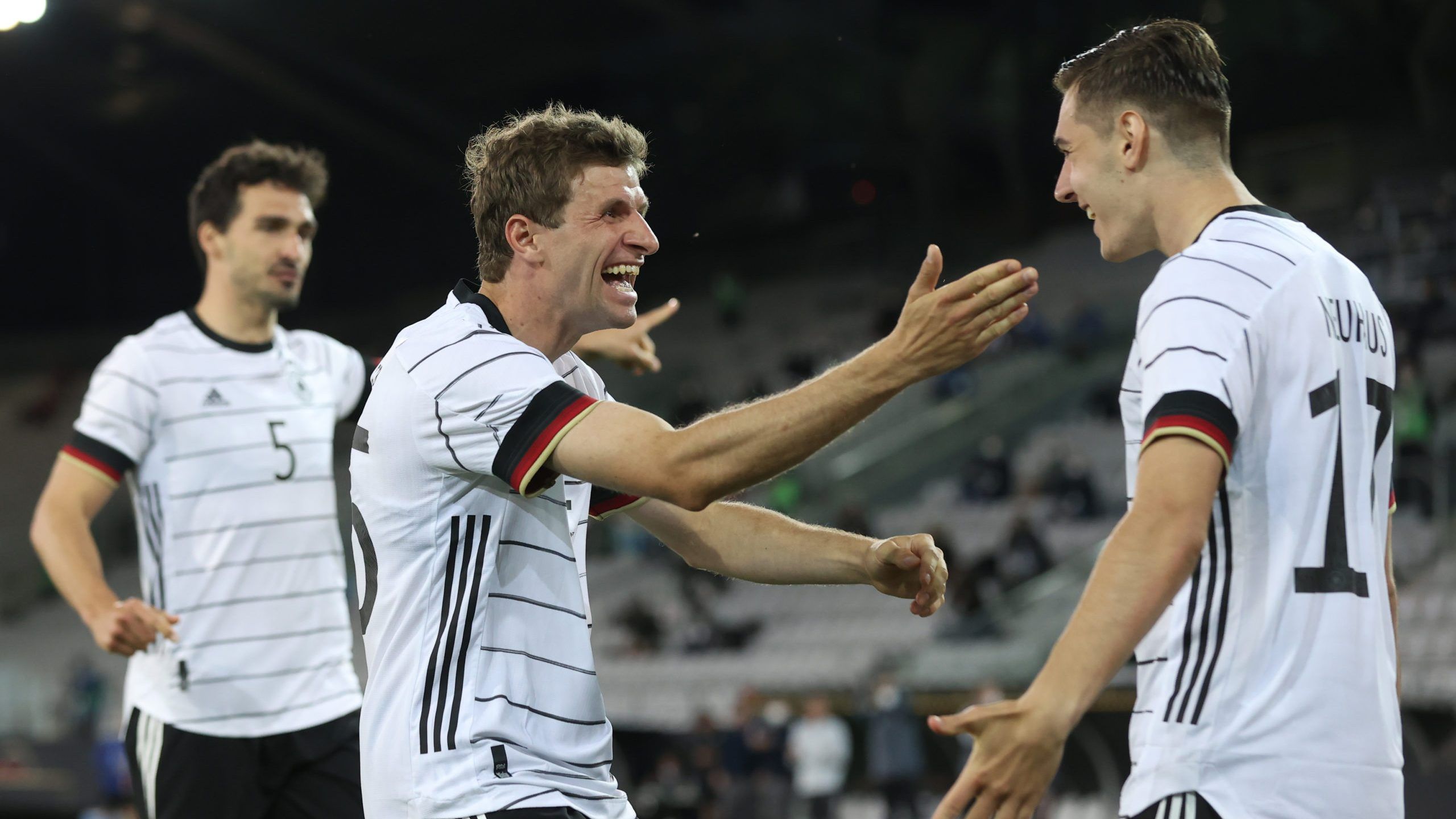 Bundesliga. Florian Neuhaus and Yussuf Poulsen strike as Germany draw with Denmark on Thomas Müller's return