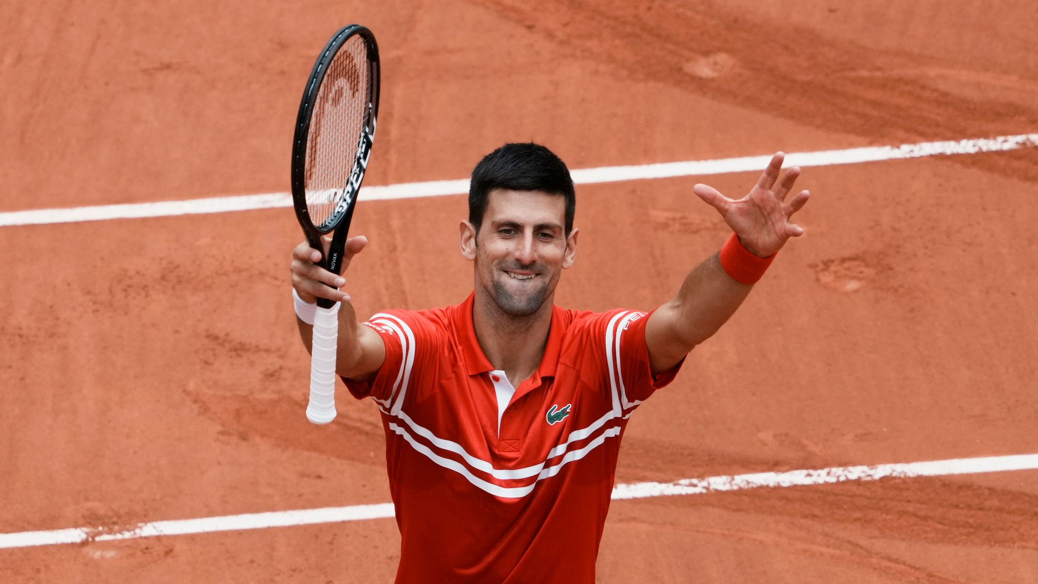 French Open: Novak Djokovic creates history as he reaches round four at Roland Garros