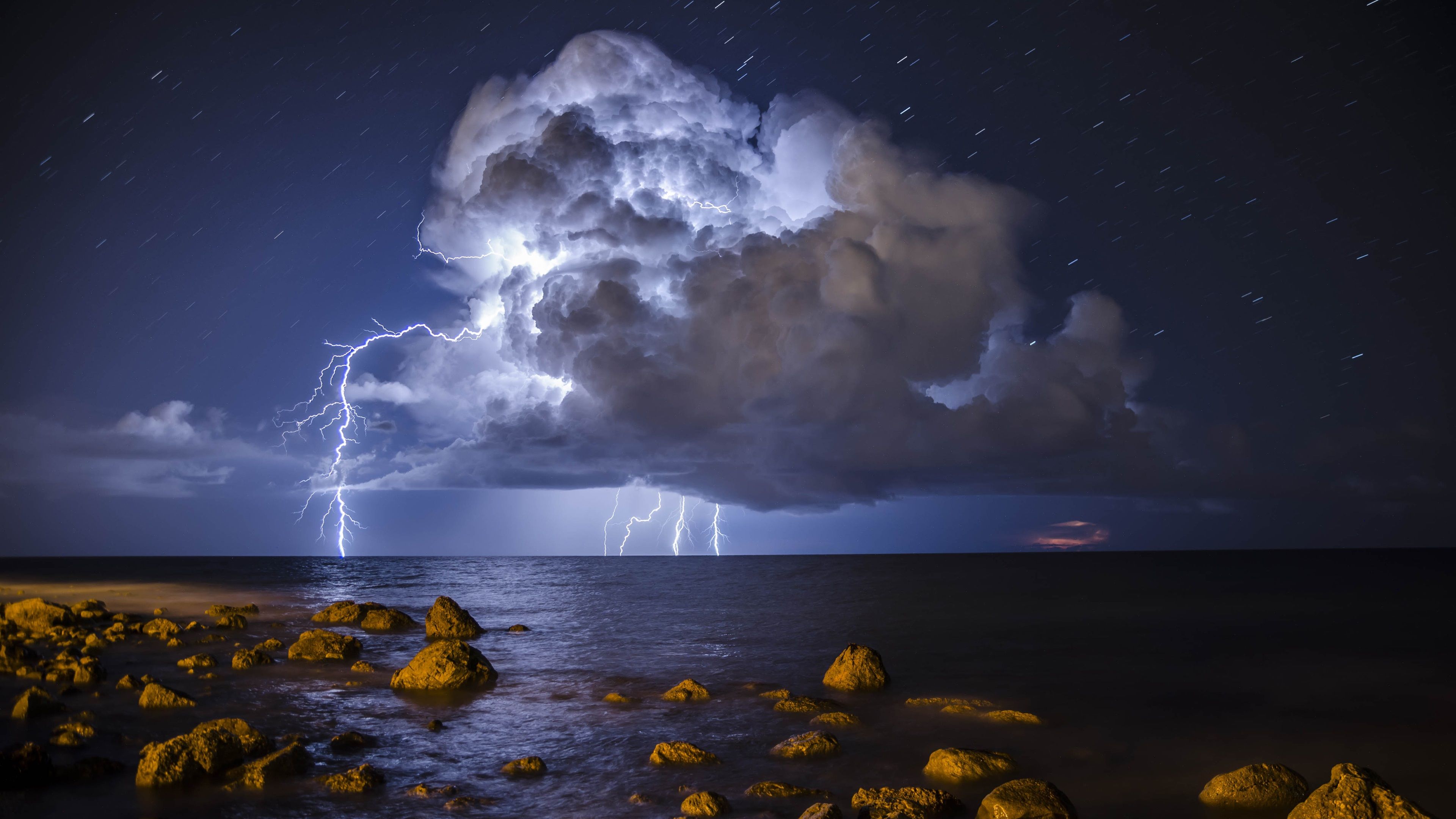 Wallpapers Storm, lightning, sea, stones 3840x2160 UHD 4K Picture, Image.