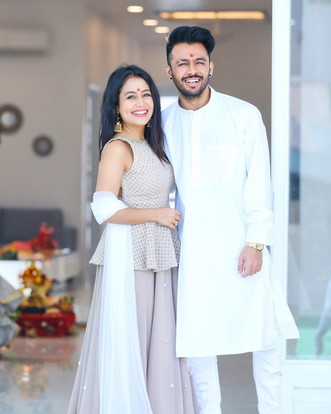 singer neha kakkar with her brother tony kakkar. Neha kakkar dresses, Indian wedding outfits, Indian bridal outfits