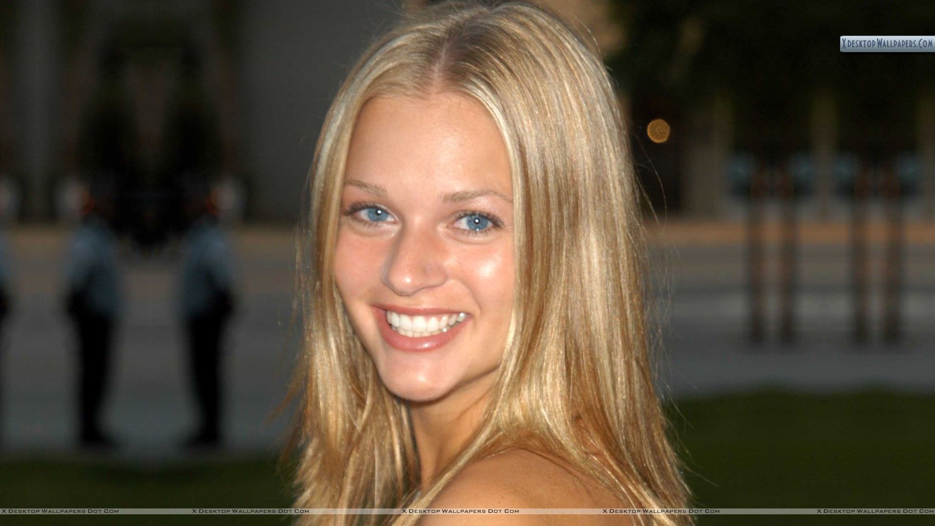 Side Face Closeup Of A.J. Cook Wallpaper