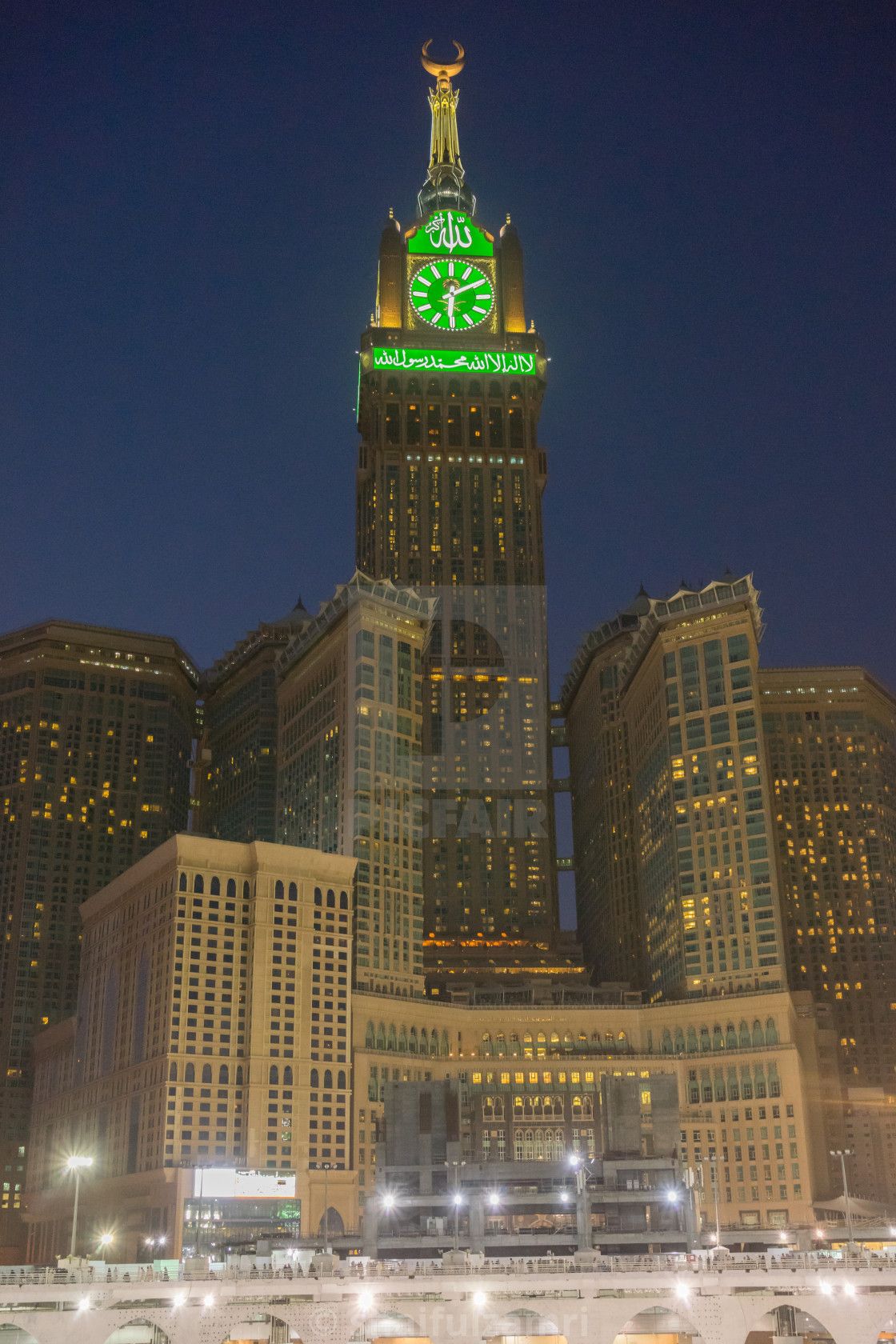 Morning view of minaret Mecca Royal Clock Tower Hotel, download or print for £1.24