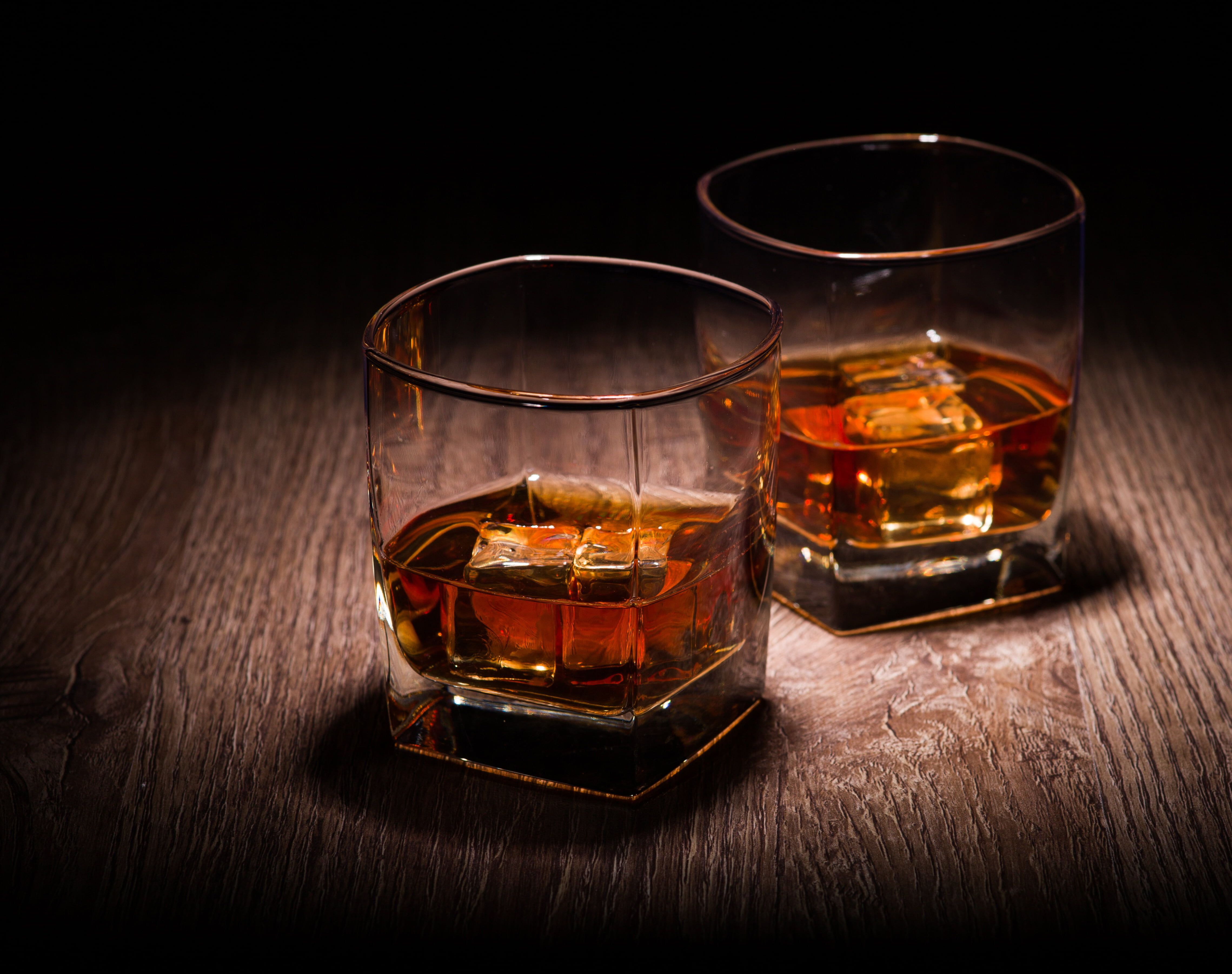 two clear shots glasses #ice #glass #ice #whiskey a glass of whiskey K # wallpaper #hdwallpaper #desktop. Whisky, Small batch bourbon, Whiskey