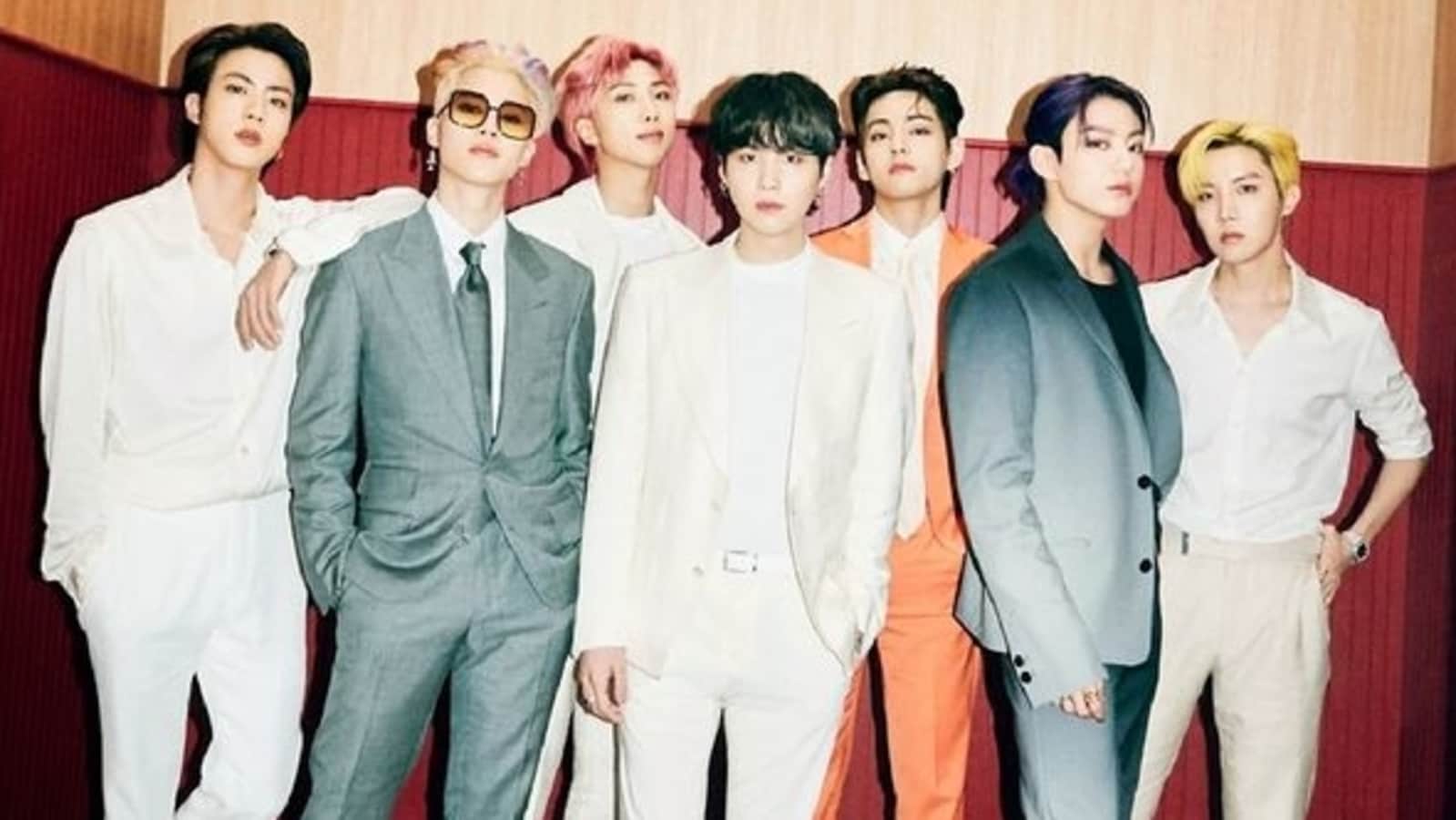 BTS Butter concept photo: 'Pink Joon' returns, Jimin's rainbow hair and Jungkook's purple ponytail win fans over