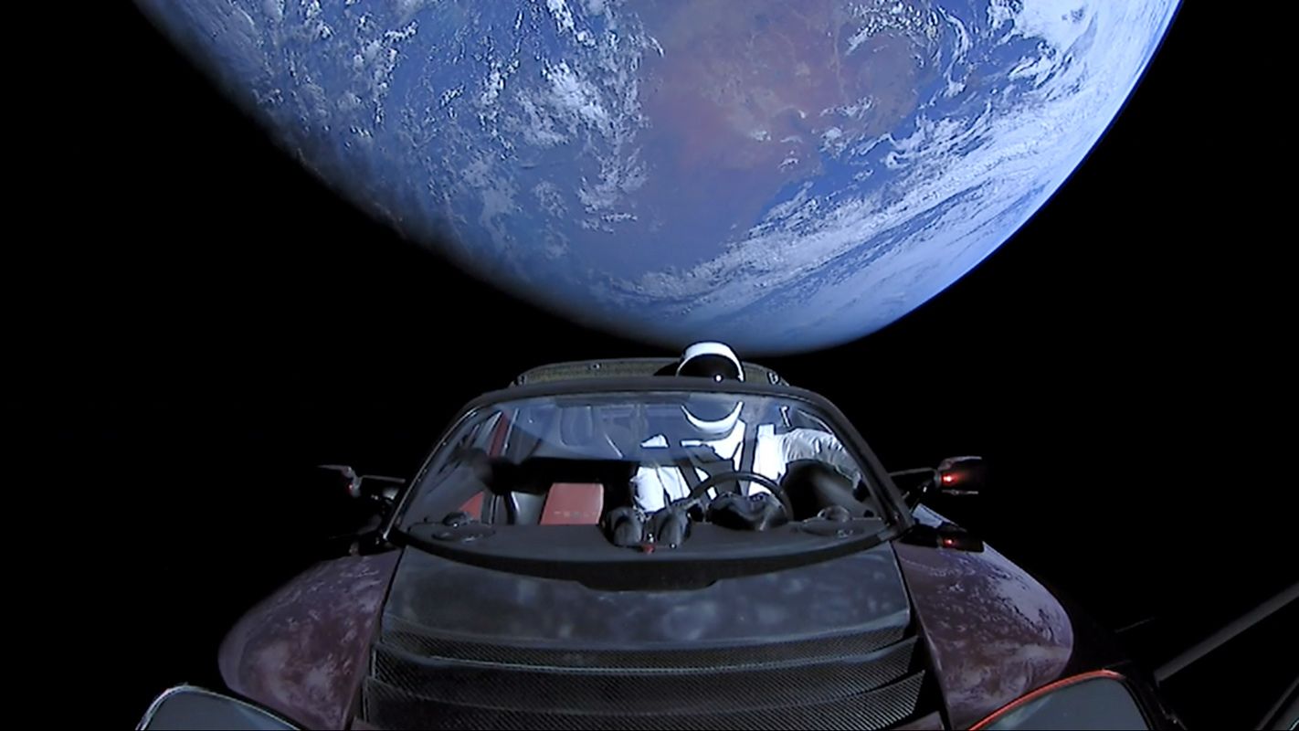 SpaceX's Epic Road Trip Photo: Starman Rides a Tesla Roadster Across Space