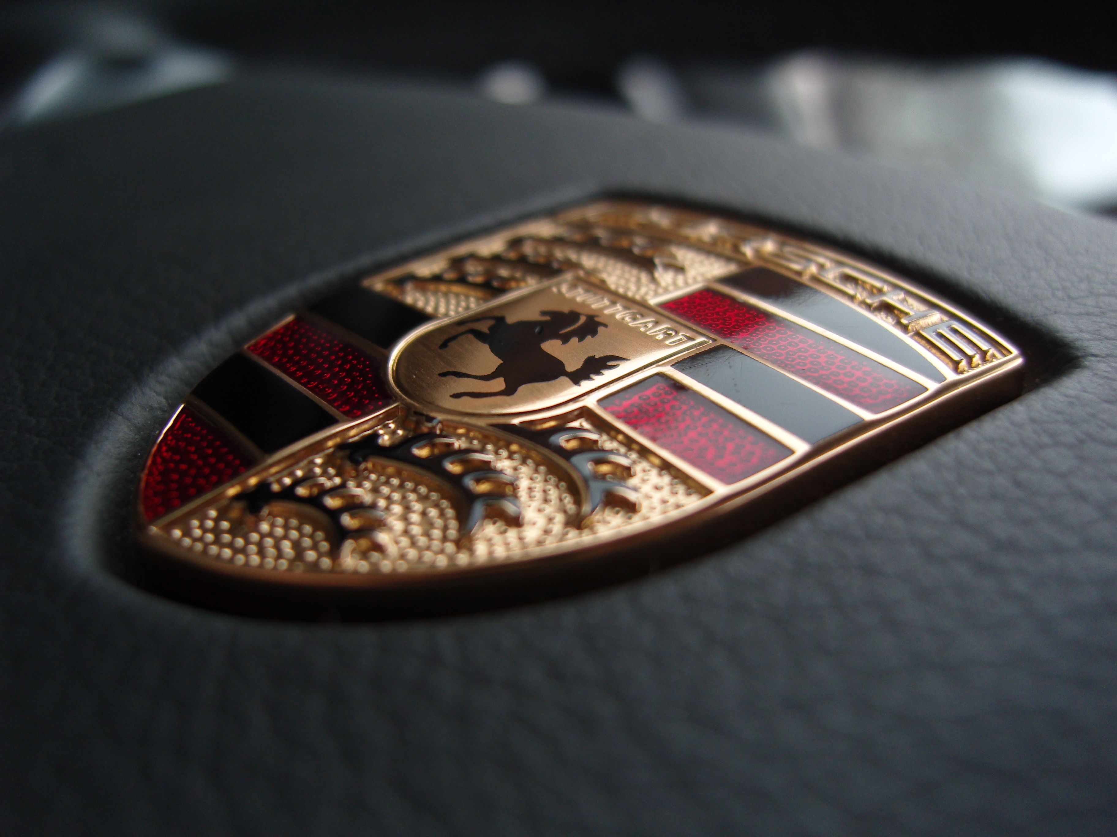 Porsche emblem on a steering