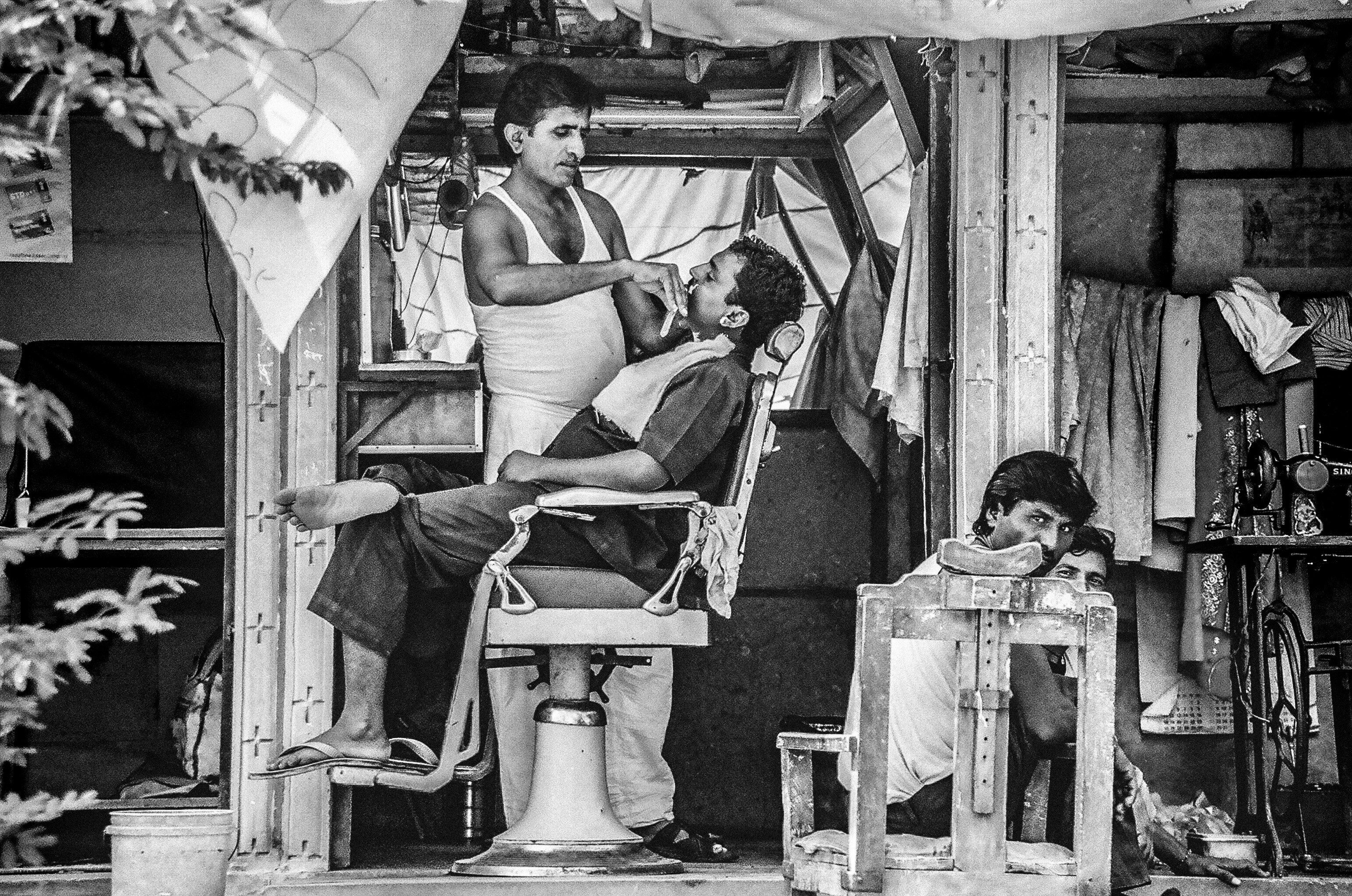 Black And White Shot Of Street Barber Shop And Man HD Wallpaper
