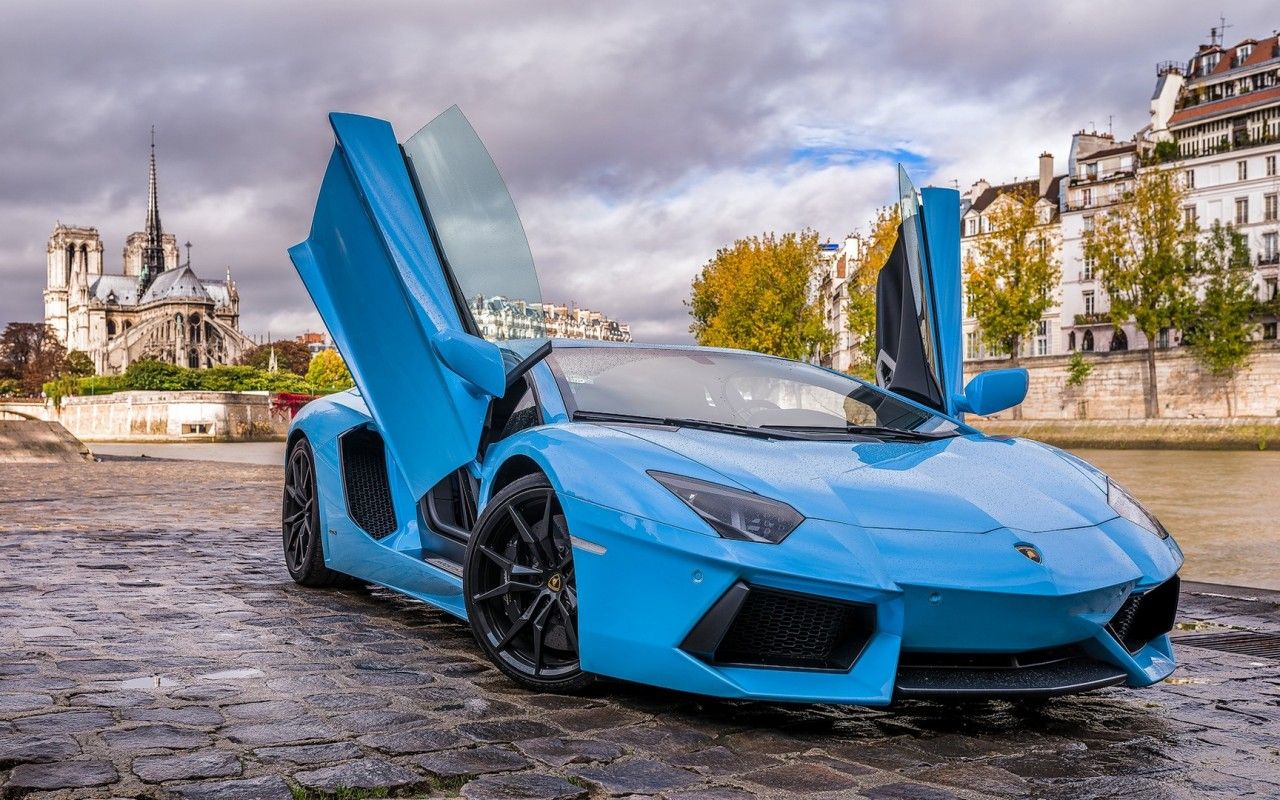 Blue Lamborghini Aventador With Doors Open On City Street 3D Models. Free