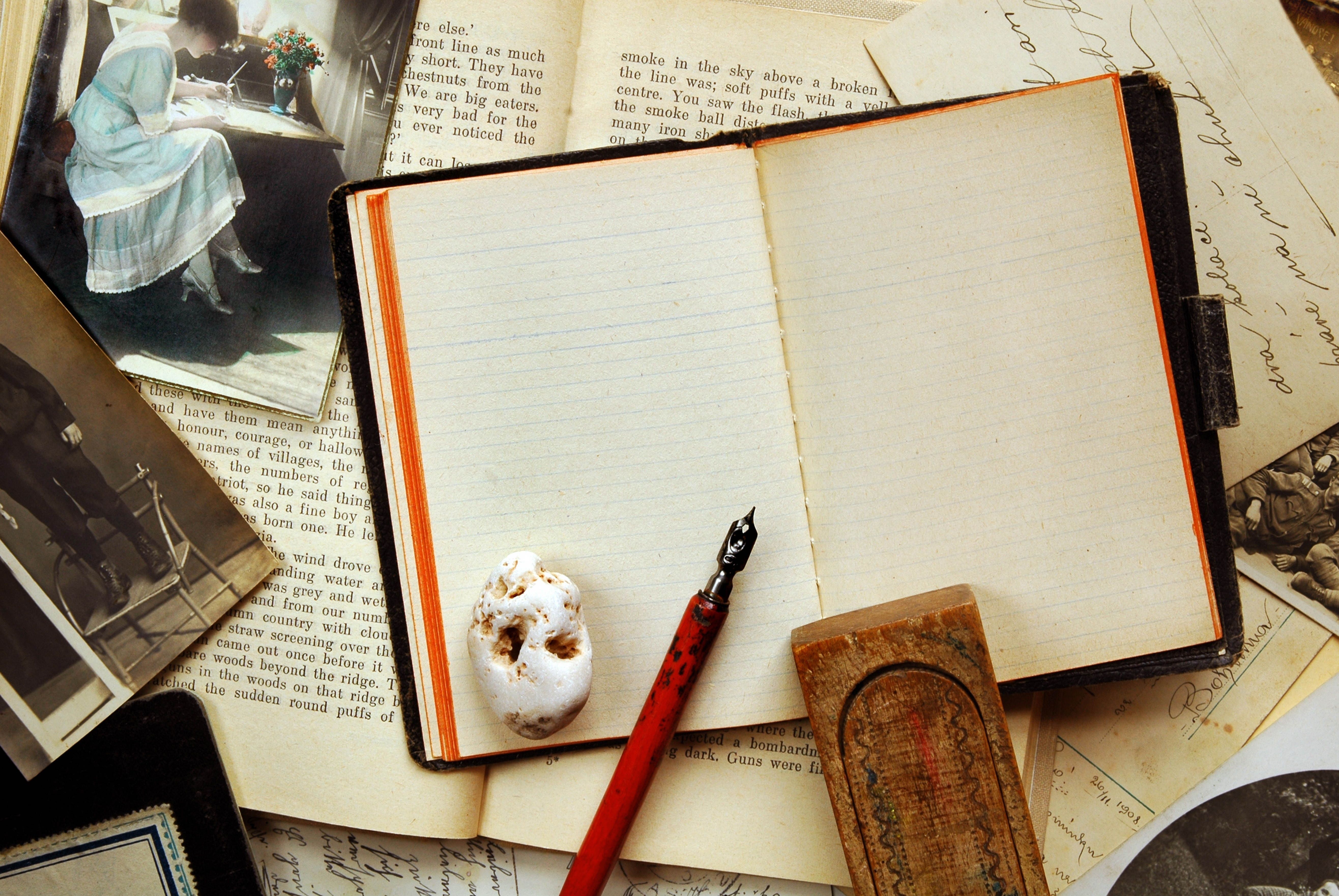 Old books with a photo on the table with an old pen wallpaper and image, picture, photo