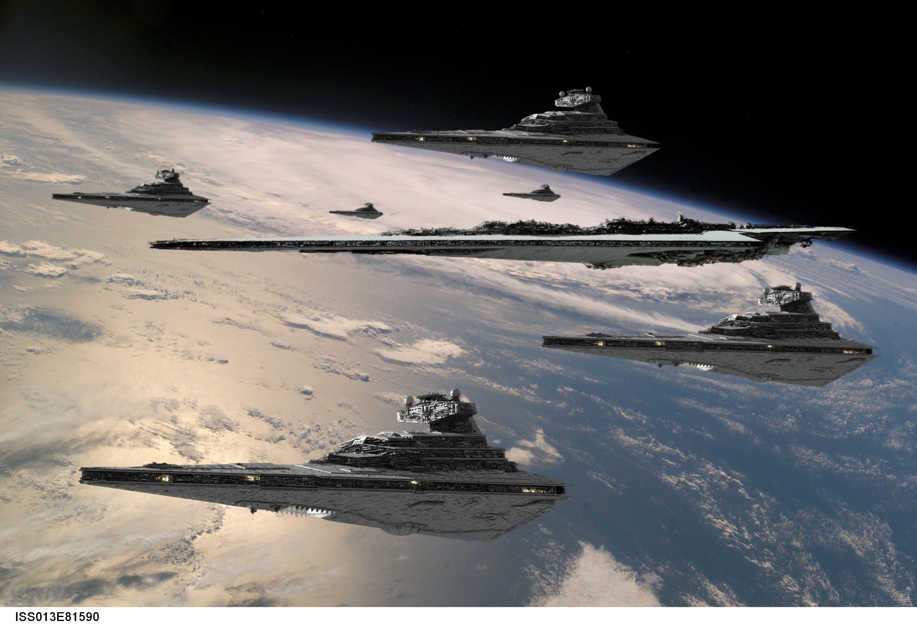 The Imperial fleet looms over a nearby planet HD Wallpaper