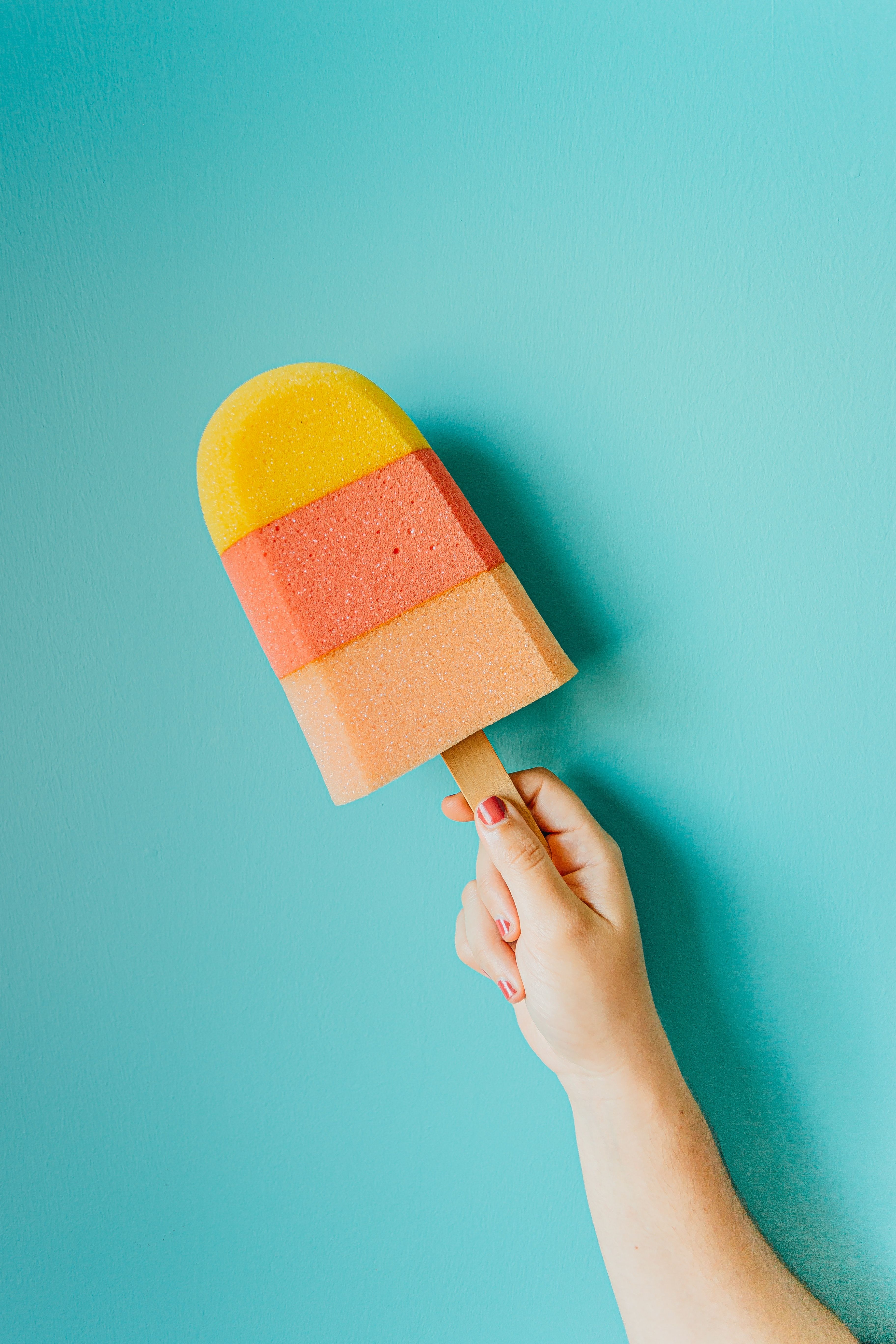 Colorful ice cream on blue background · Free