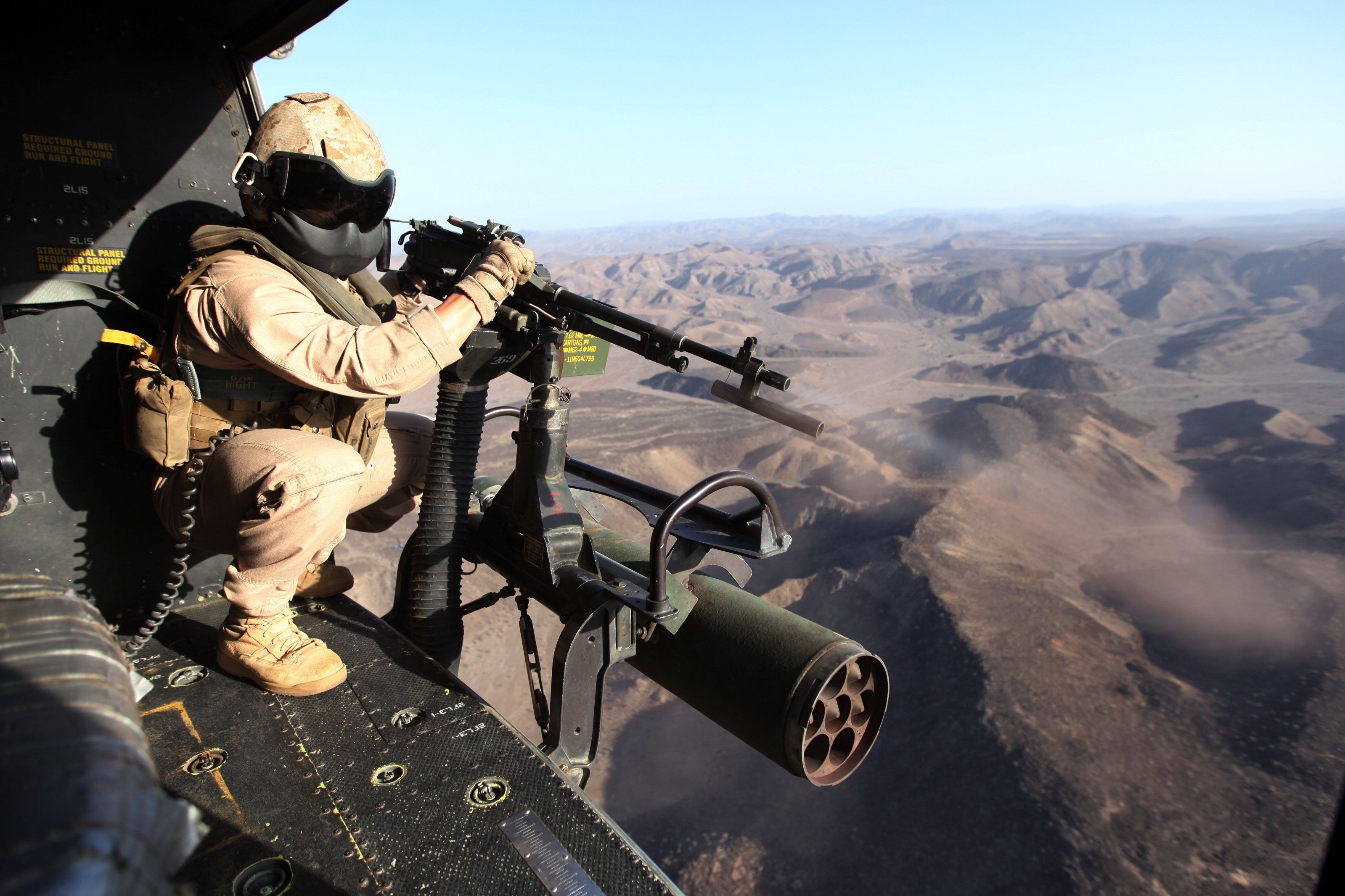 Free photo: Aerial Photography of Person Holding Machine Gun during Daytime, Helicopter, Man