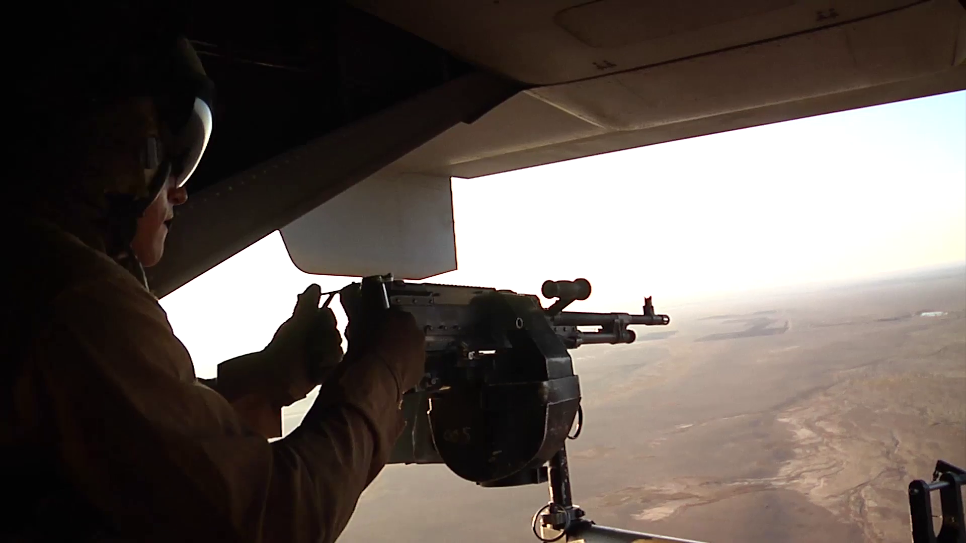V22 Mv22 Osprey helicopter door gunner Stock Video Footage