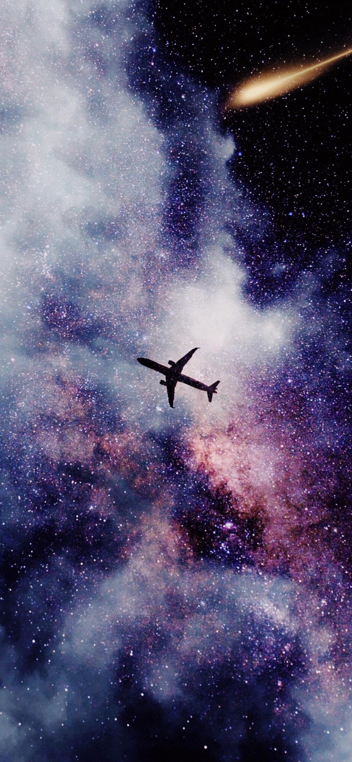 Took this photo with my iPhone X of the plane at PDX then decided to edit it and add a space theme. I do a lot of wallpaper and edits so I'm