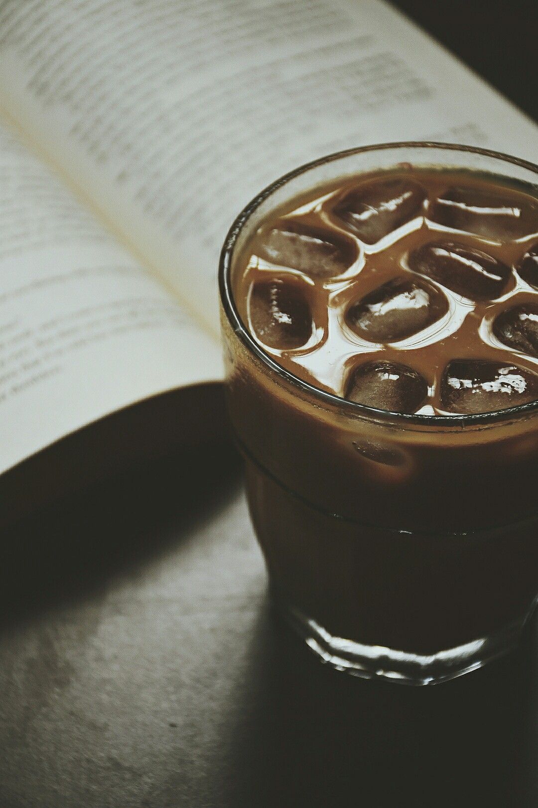 coffee #aesthetic #theme #vsco #ice #coldcoffee #book #dark #fade. Coffee and book, Aesthetic photo wall, Fall aesthetic