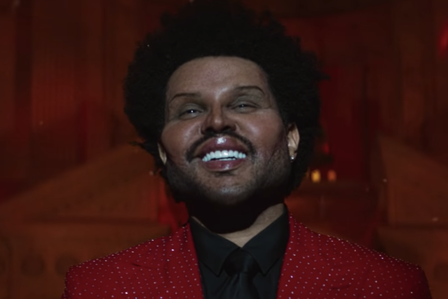 Why The Weeknd's Face Looks So Different in His Music Video for 'Save Your Tears'