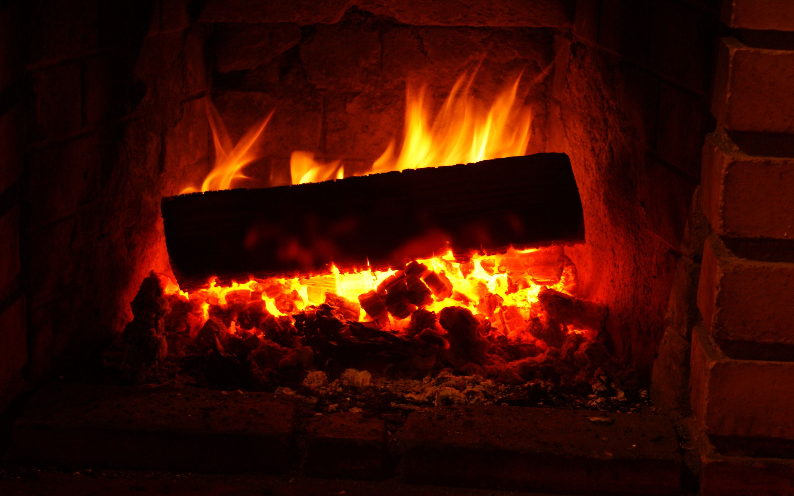 Download wallpaper 2560x1600 fireplace, wood, embers, fire widescreen 16:10 HD background