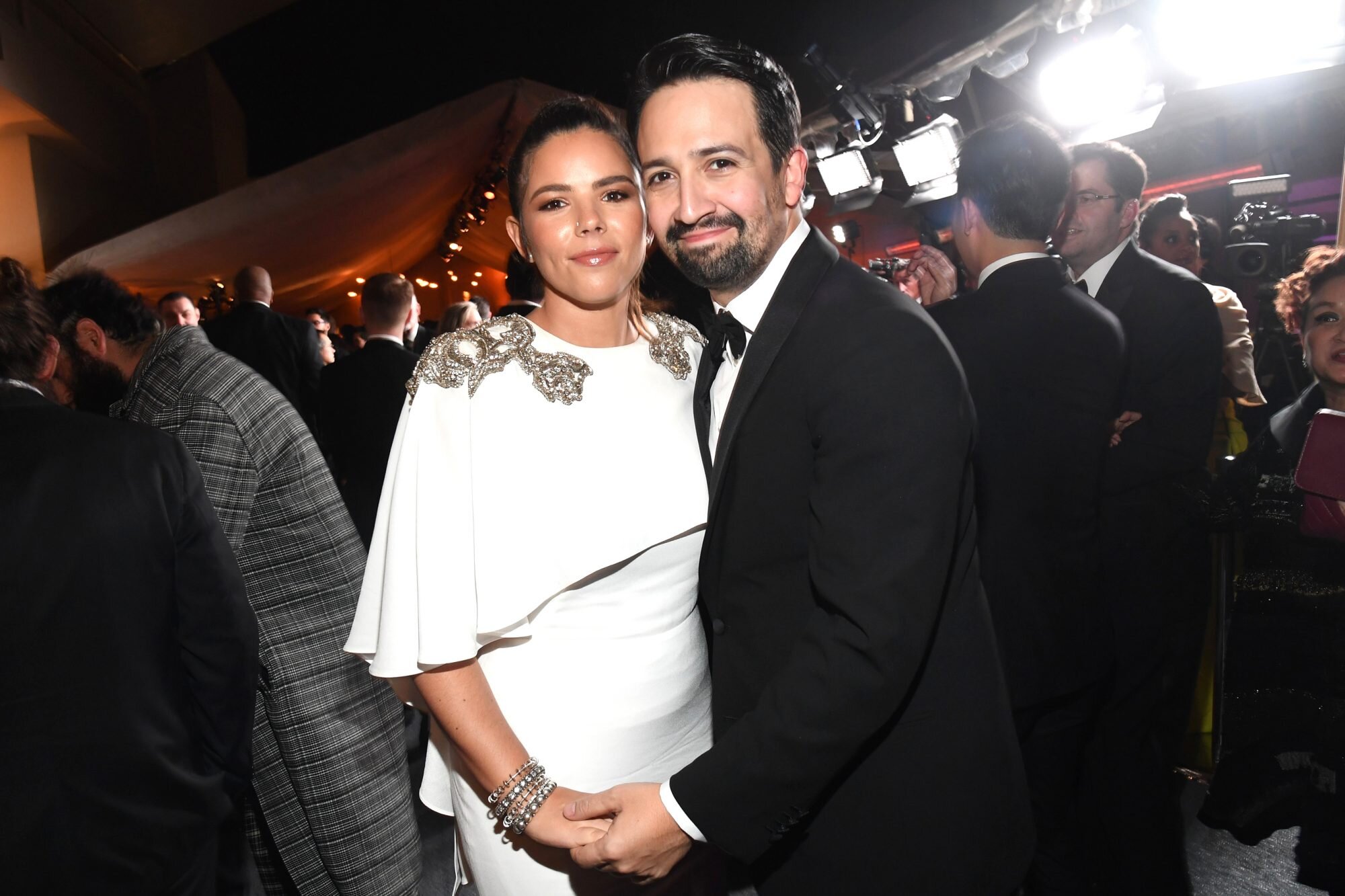Lin Manuel Miranda's Wife Says She 'Always Boos' When He 'Kisses Someone' In Hamilton