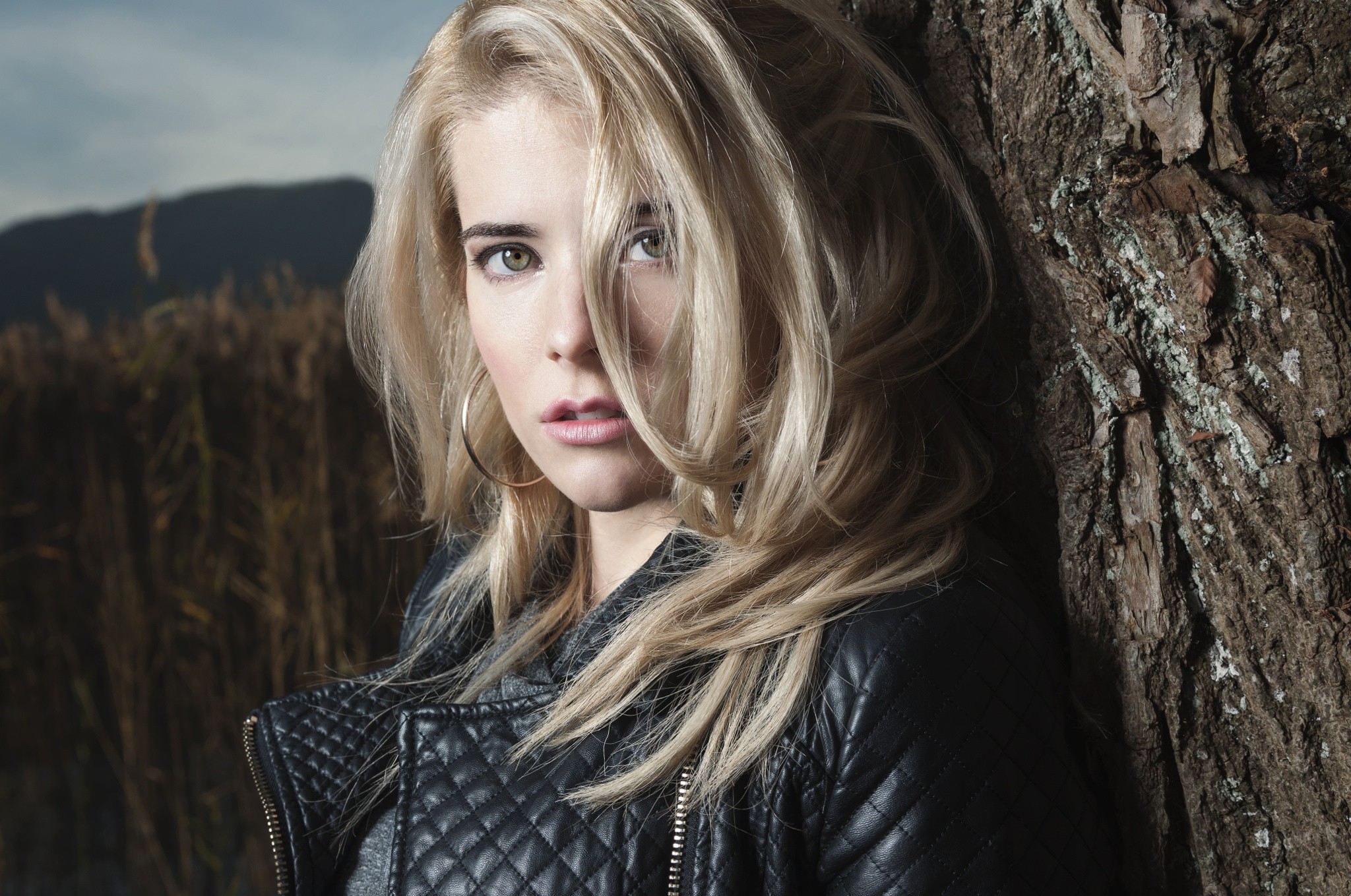 #model, #blonde, #hoop earrings, #women outdoors, #hazel eyes, #women, #portrait, #jacket, #looking at viewer, #leather jackets, #hair in face, #open mouth, wallpaper. Mocah HD Wallpaper