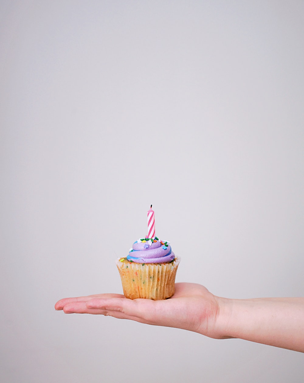 Cupcakes In Hand Picture. Download Free Image