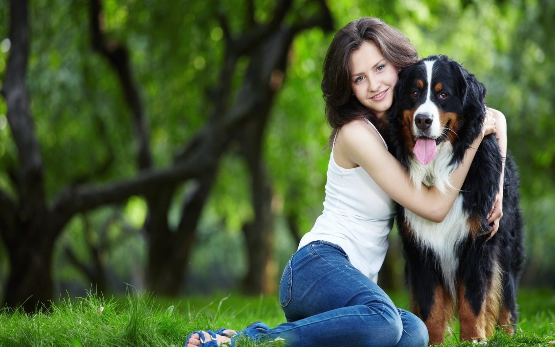 Wallpaper, forest, animals, women outdoors, looking at viewer, grass, sitting, jeans, tongues, dog like mammal, dog walking 1920x1200