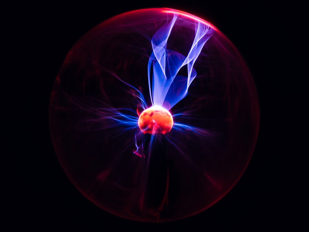 red and blue plasma ball photo