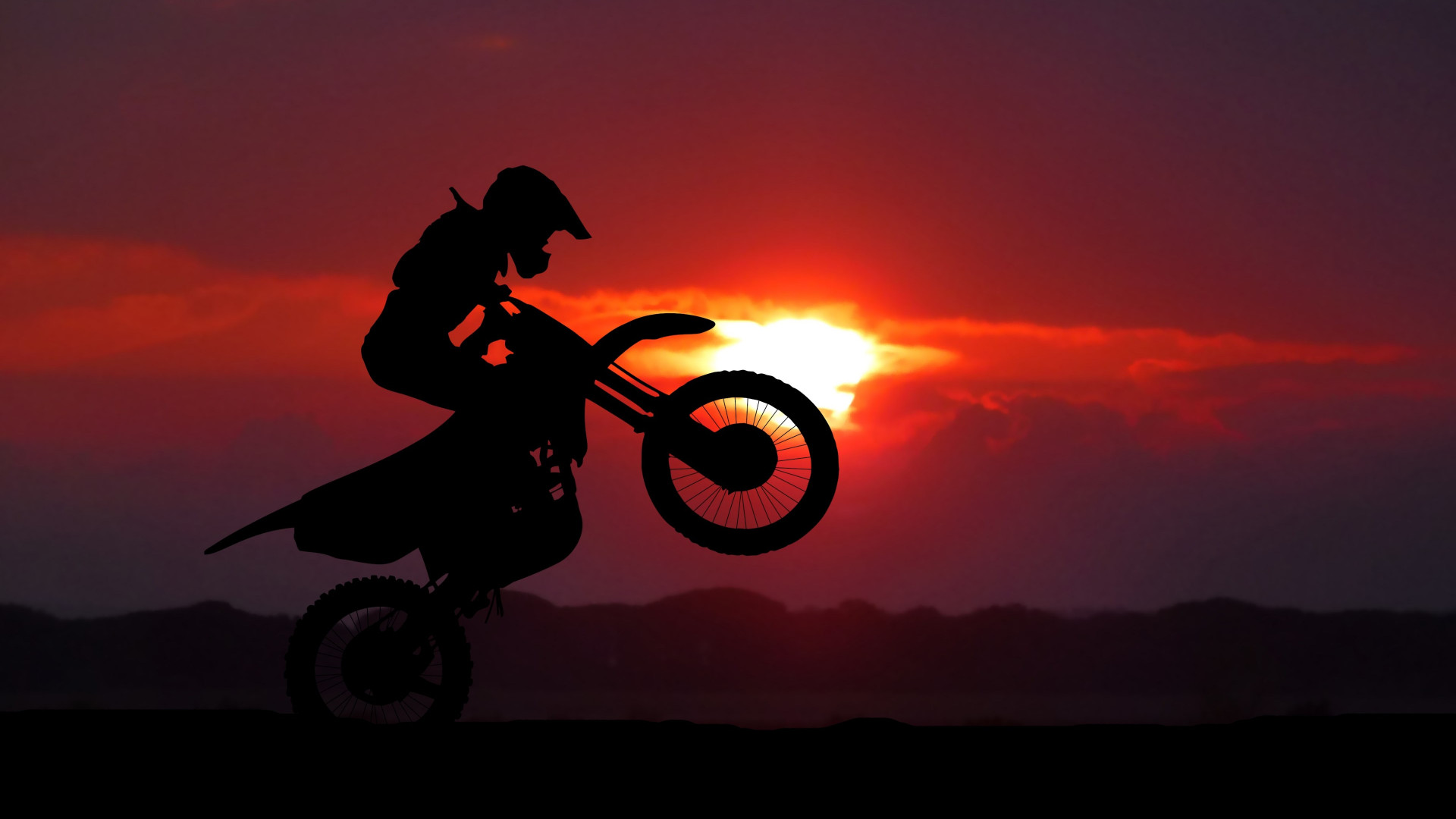 Download wallpaper: Biker on motorcycle at sunrise 1920x1080