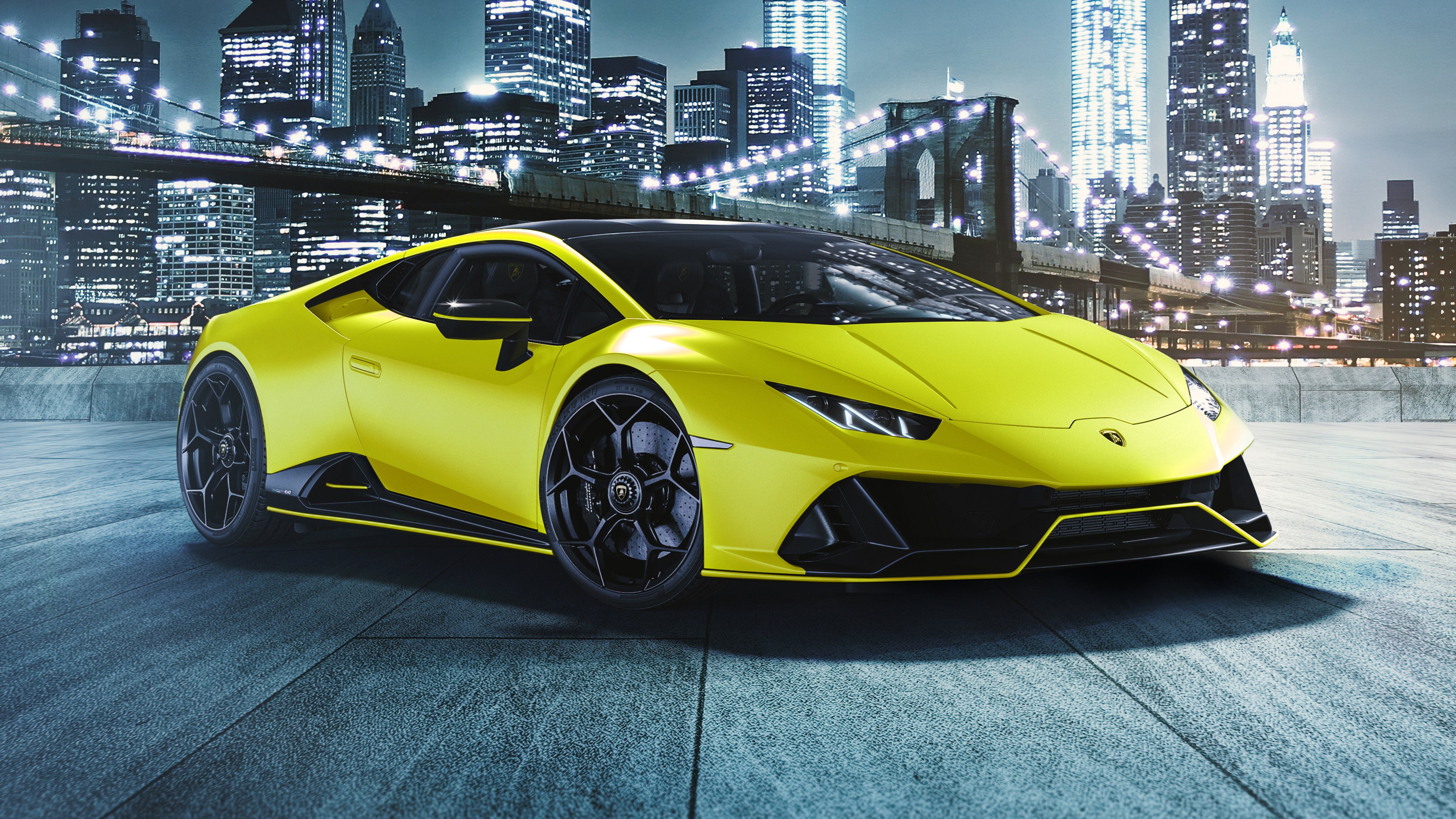 Lamborghini Huracán EVO yellow car against city background wallpaper and image, picture, photo