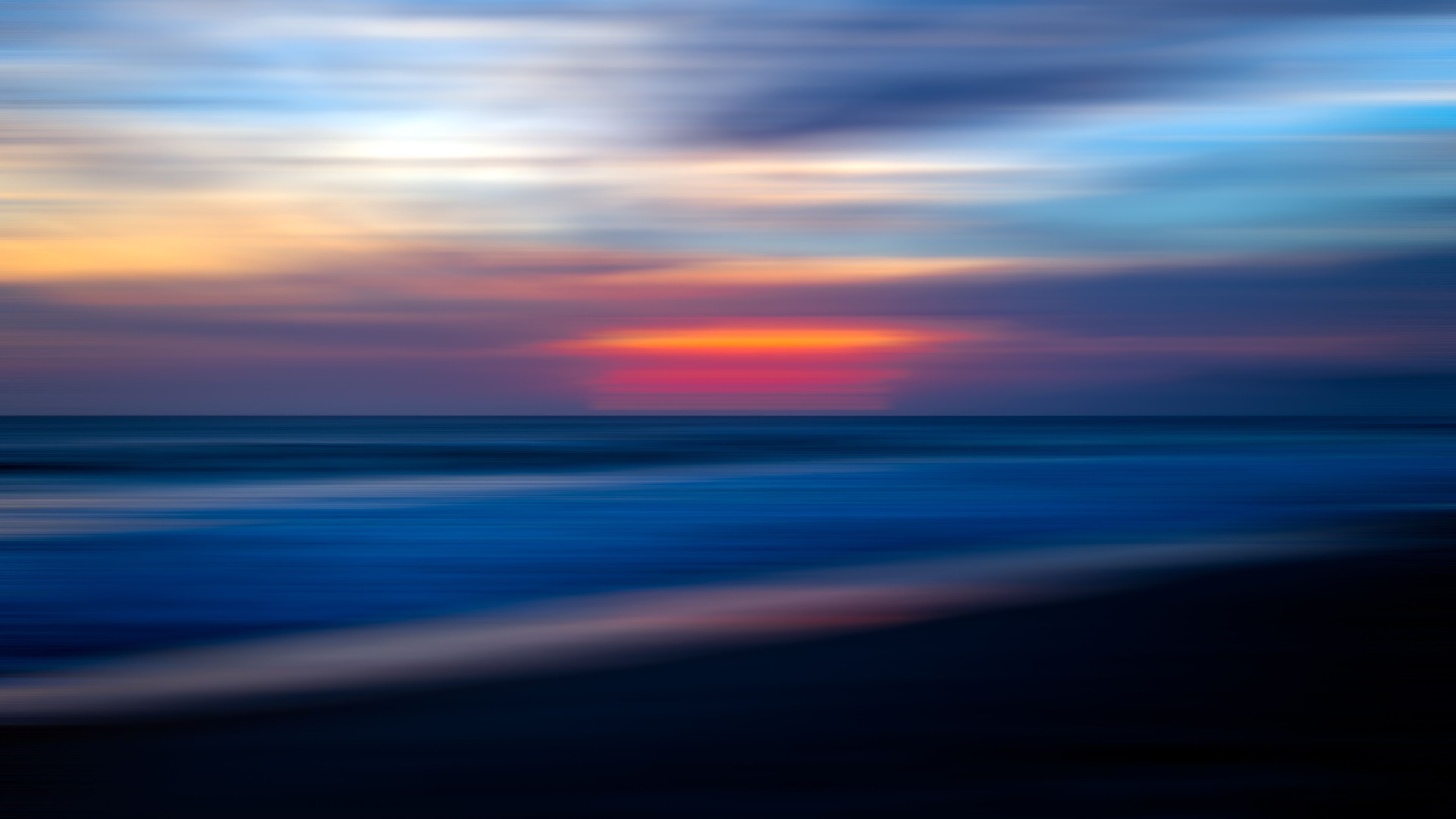 Wallpaper 4k Sea Ocean Water Sunset Blur 5k Wallpaper