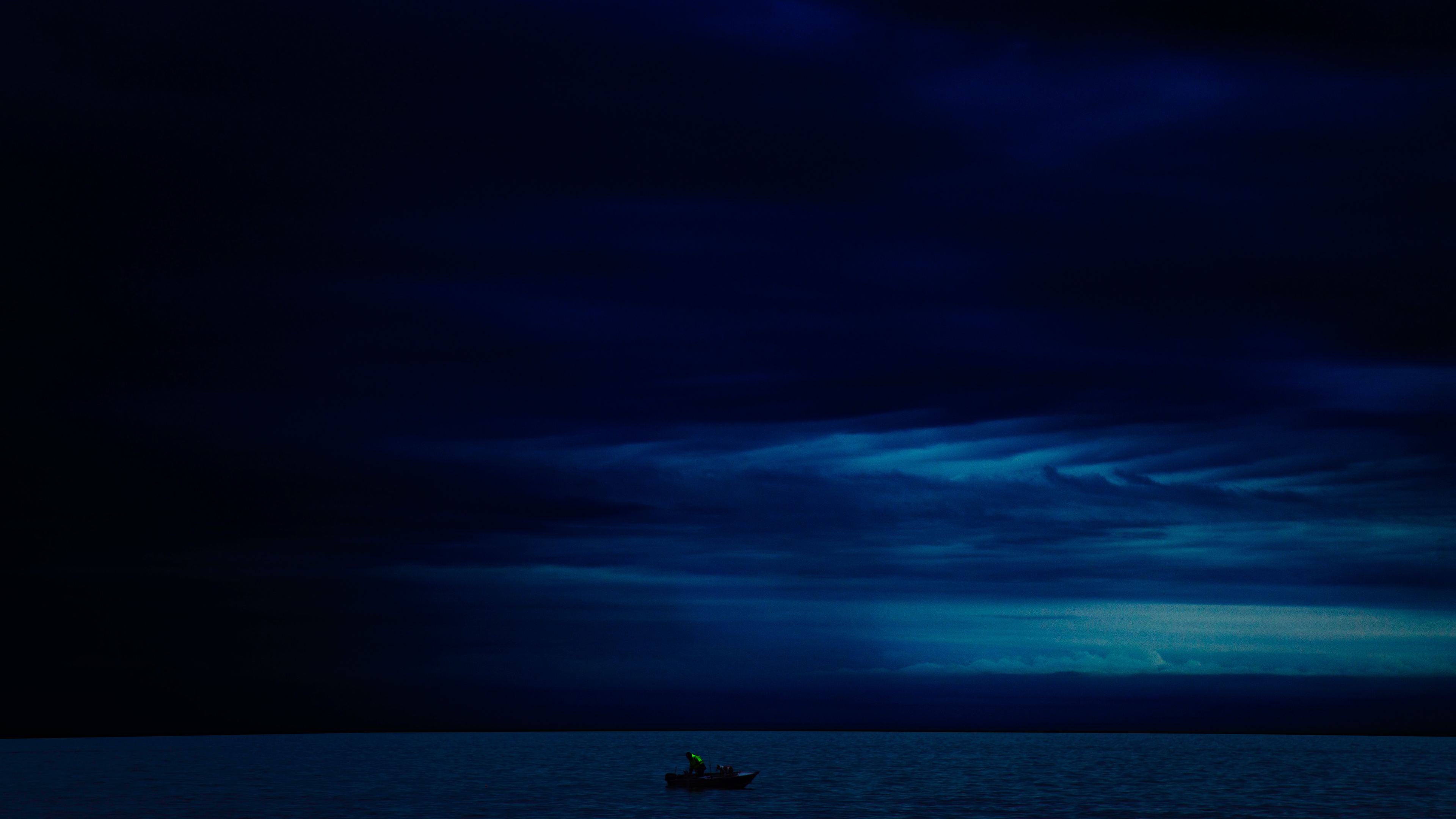 Wallpaper 4k Dark Evening Blue Cloudy Alone Boat In Ocean 4k 4k Wallpaper