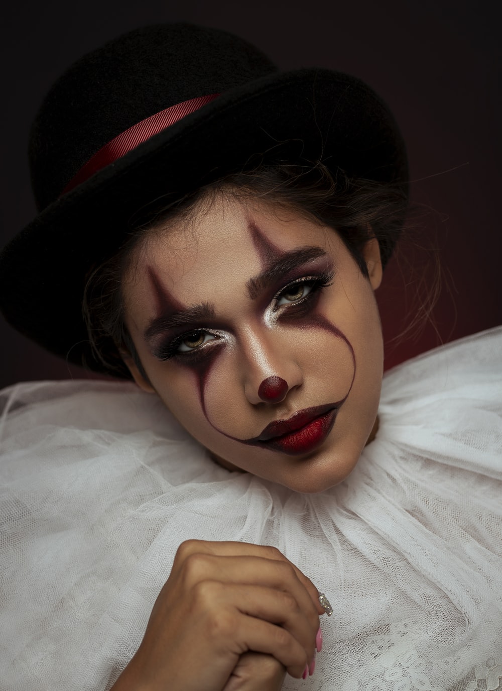 Woman With Clown Themed Makeup Photo