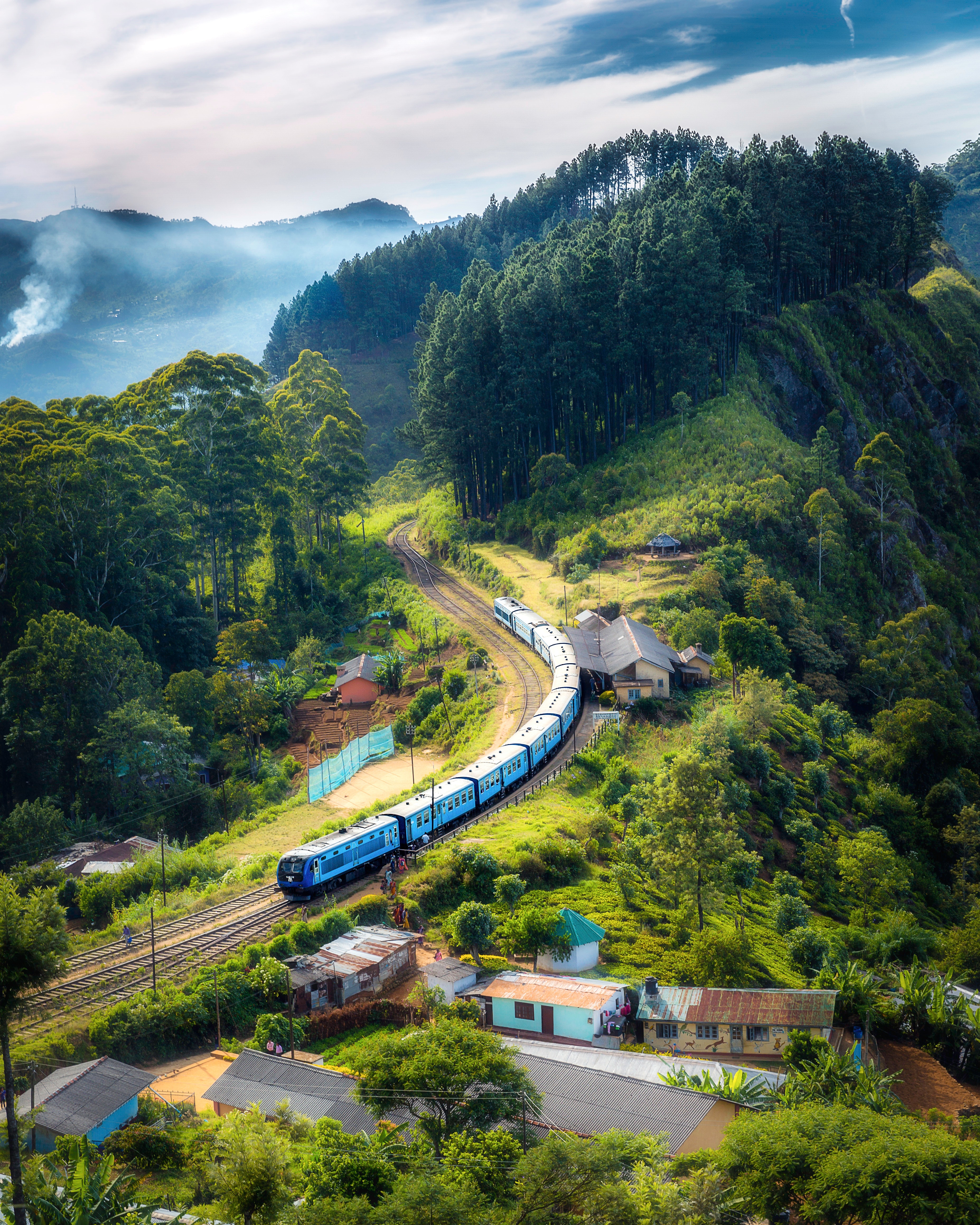 Photo Of Railway On Mountain Near Houses · Free