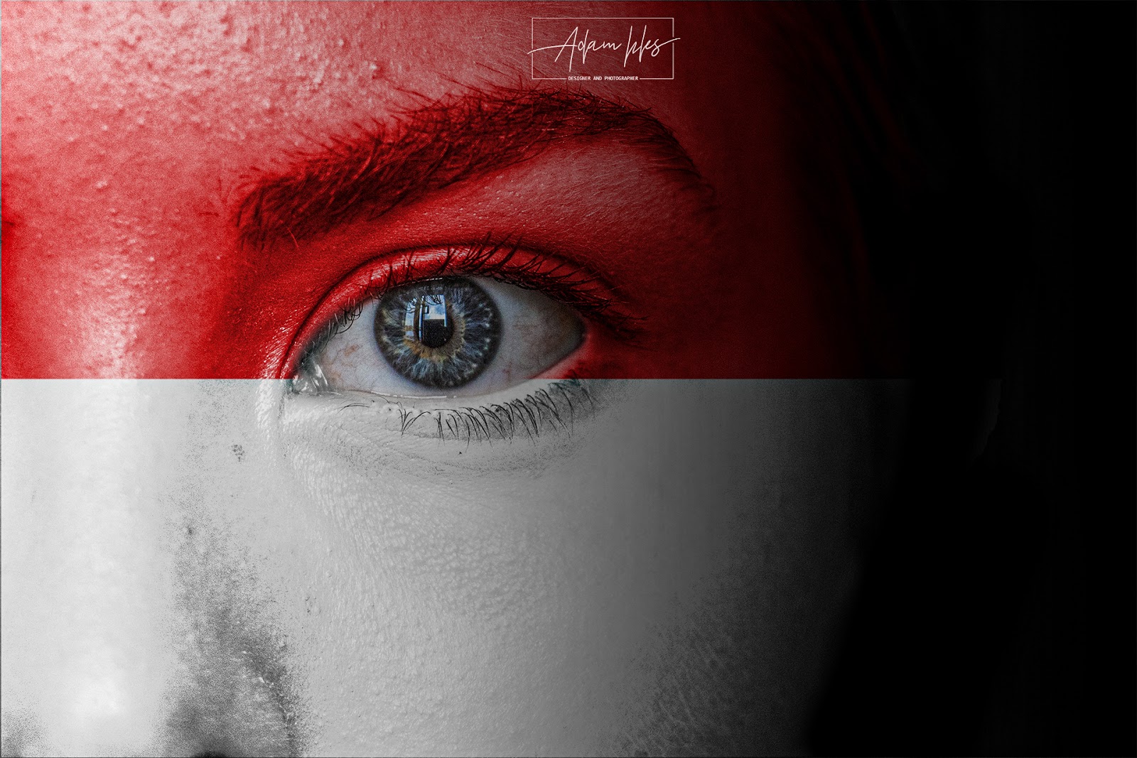 Photo of the flag of Indonesia on the face of a Child background