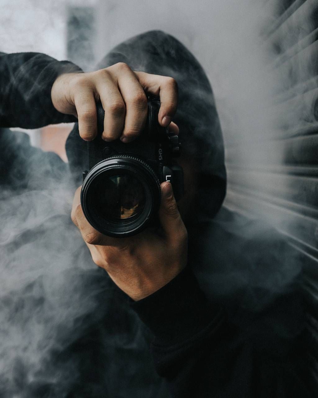 Man posing with camera - PixaHive
