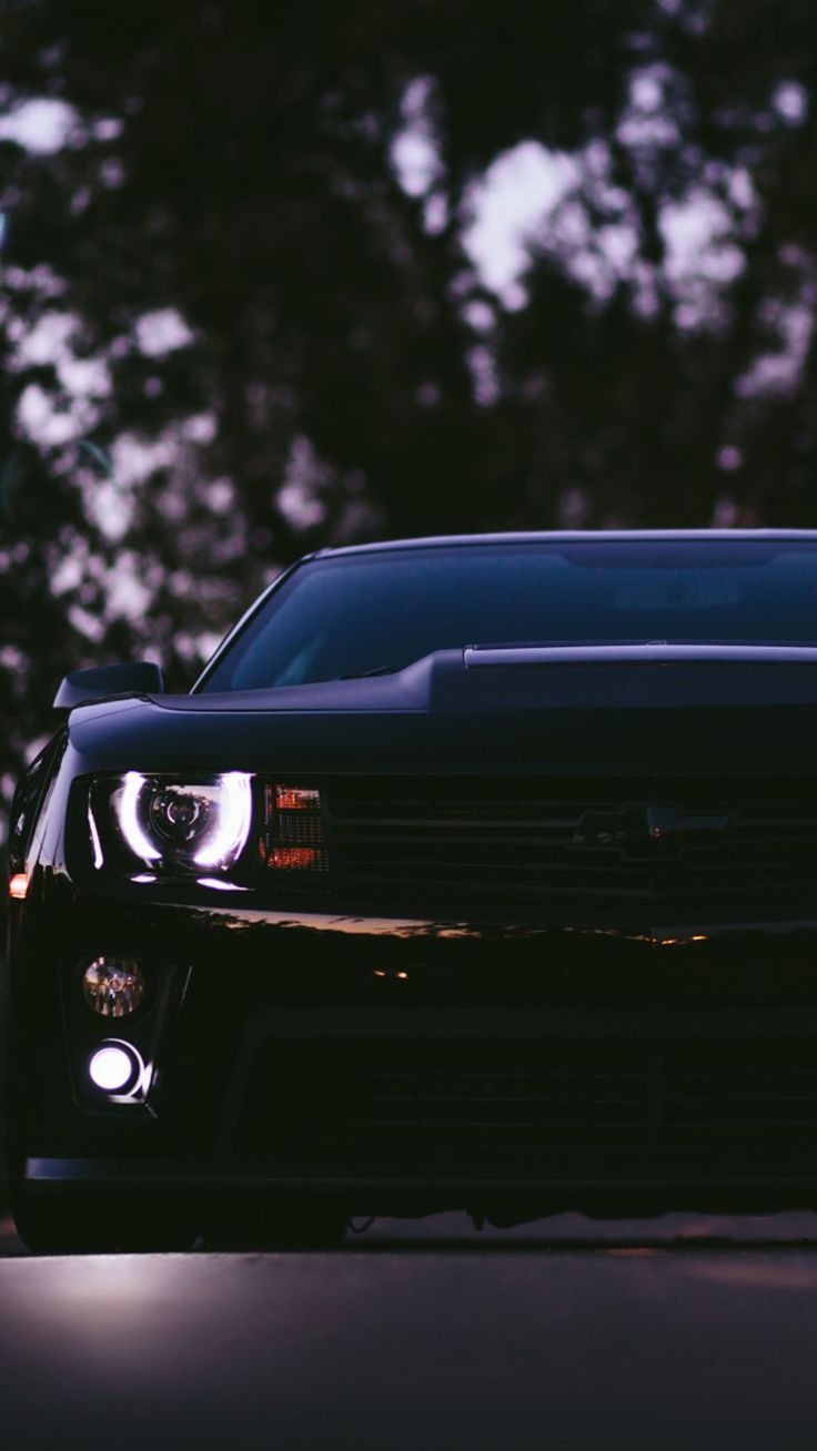 Black Camaro SS car wallpaper for #iPhone and #Android at wallzapp.com # wallpaper #iphonewallpaper #