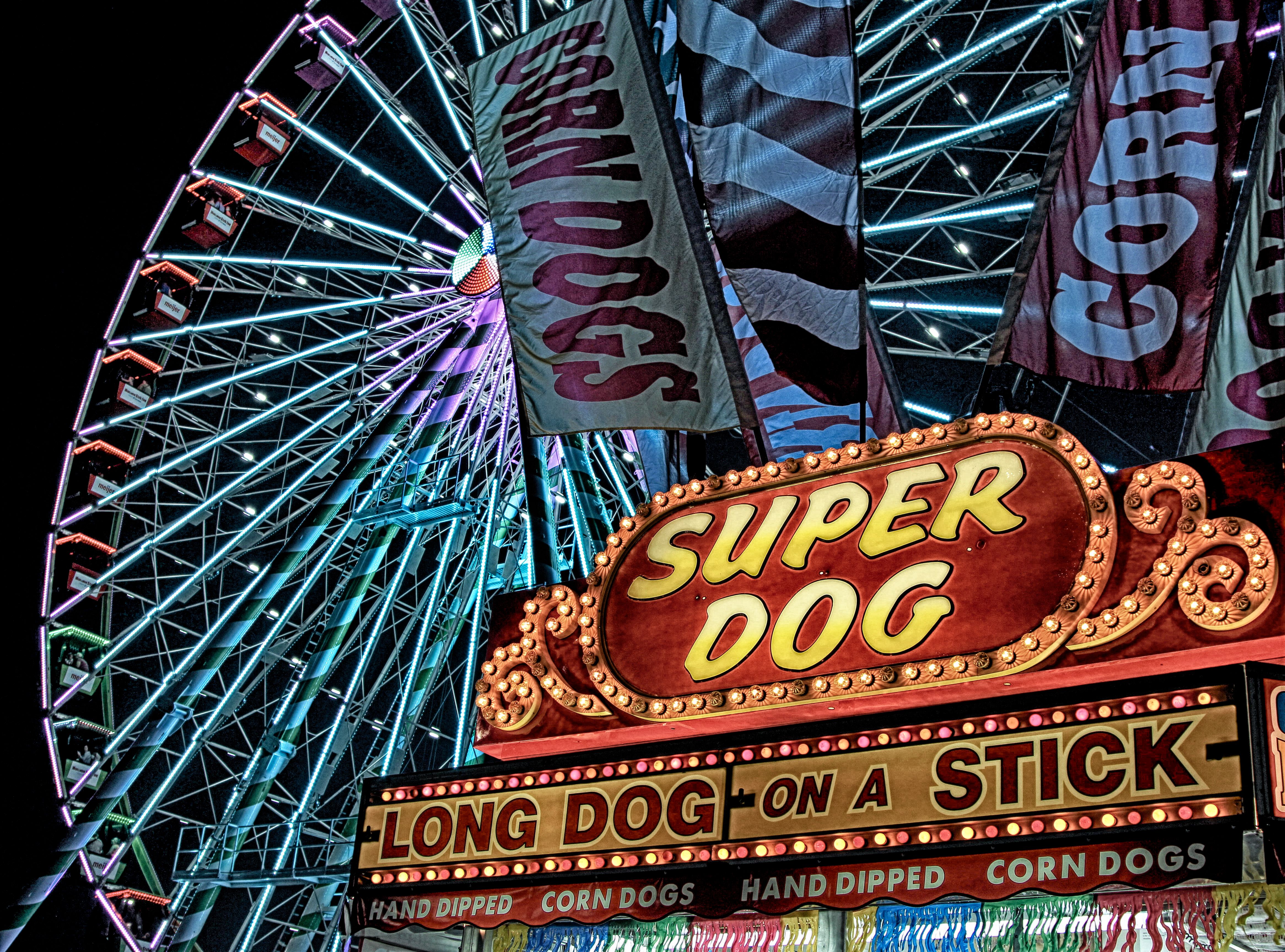 Super Dog Hot Dog Food Stall in Front of Ferris Wheel during Nighttime · Free