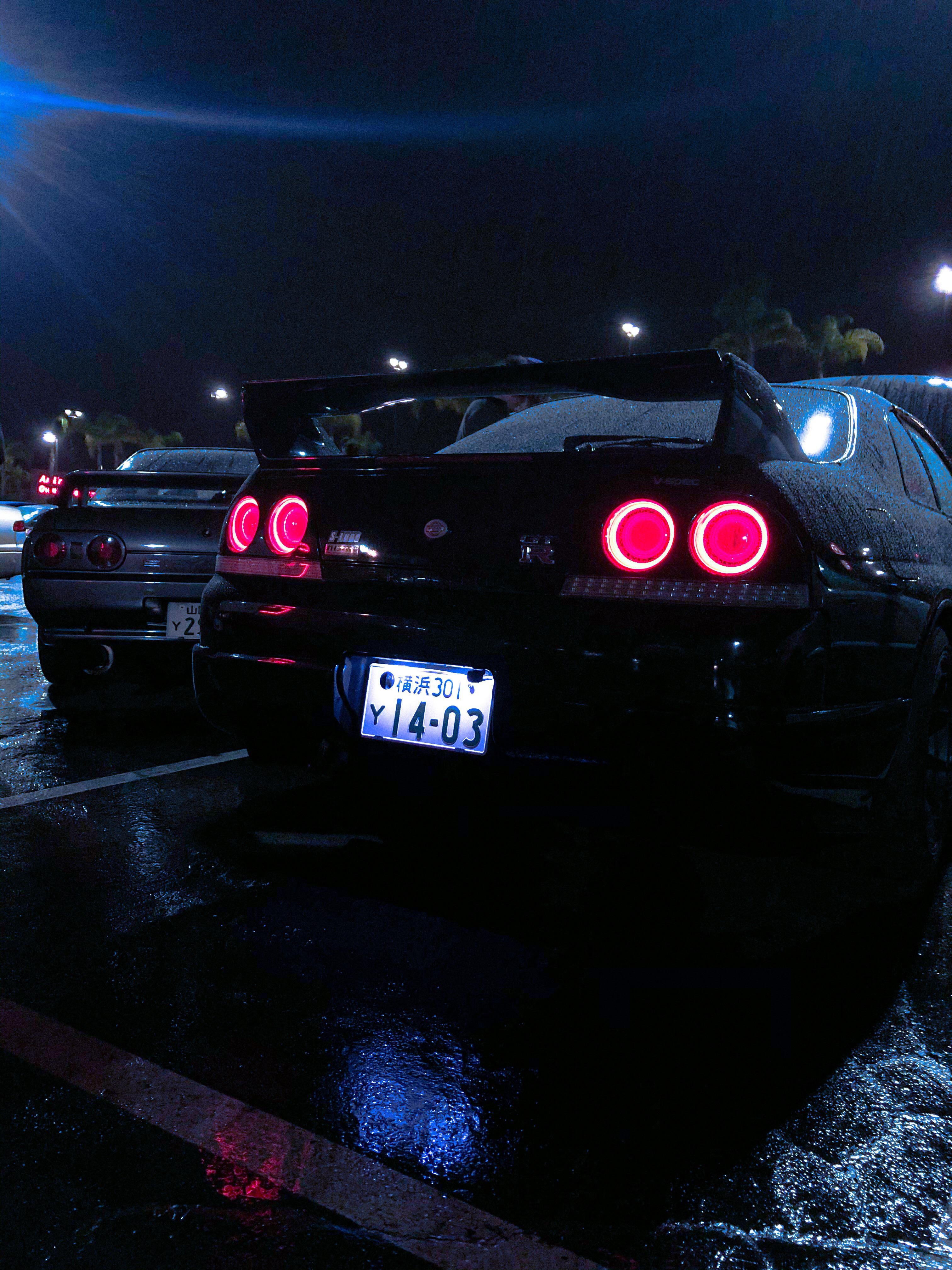 R33 Nismo GTR and R32 GTR in the rain. Makes for some good phone wallpaper.: JDM