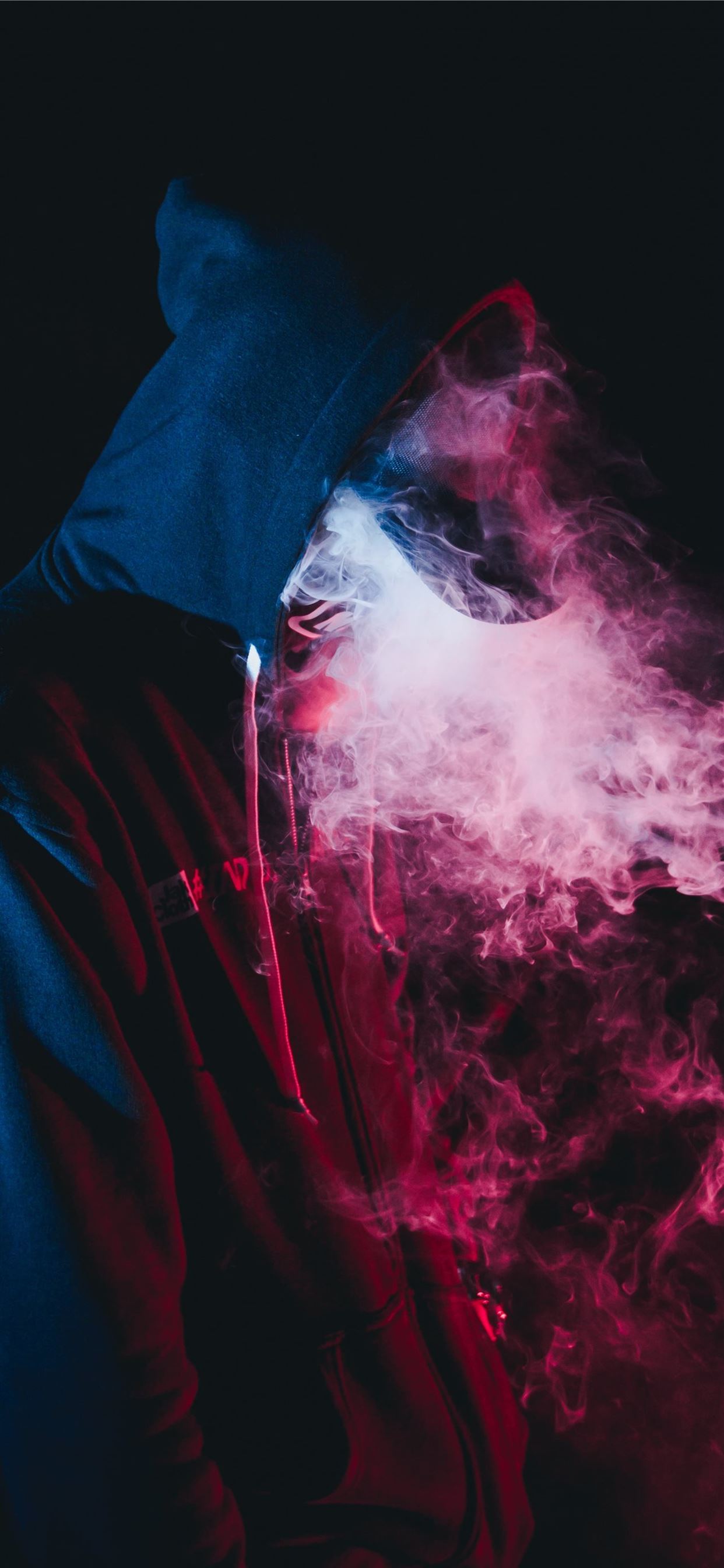 man in black hoodie smoking iPhone 11 Wallpaper Free Download